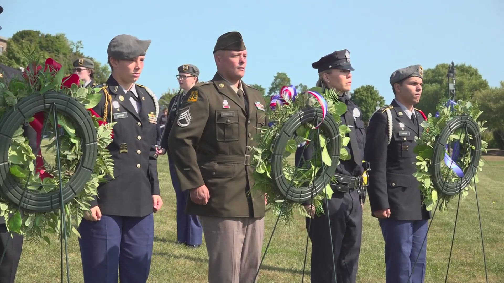 Bangor High School's Junior ROTC held a 21-gun salute and flag detail on the waterfront. It was one of many ceremonies held across the state.