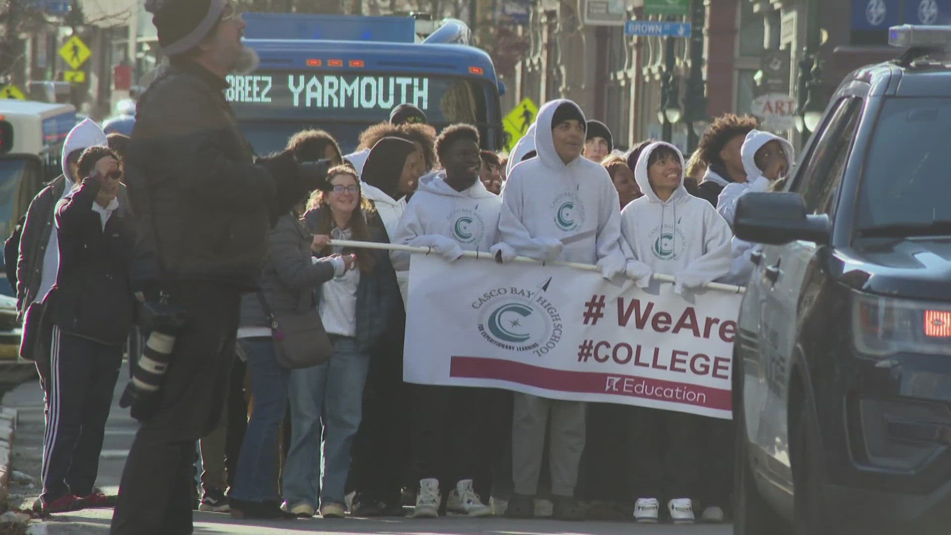 The college march is a longstanding tradition for the high school, and it allows students to show their commitment to furthering their education.