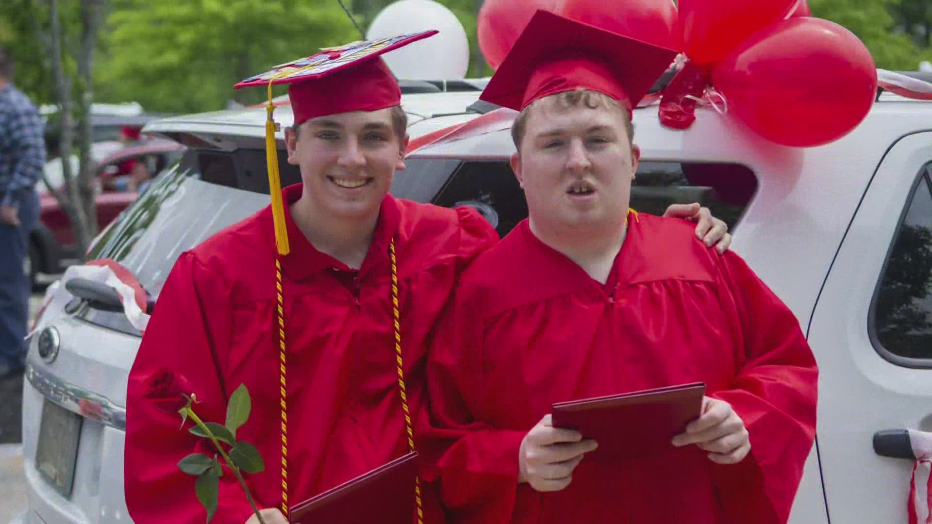 The two brothers got to compete on the basketball court together, and got their diplomas together.