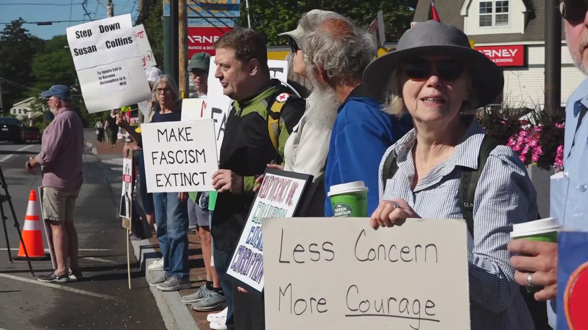 A crowd of protesters picketed at an event marking the end of a roadwork project on Route 1 in Searsport that Sen. Susan Collins, R-Maine, was scheduled to attend. 