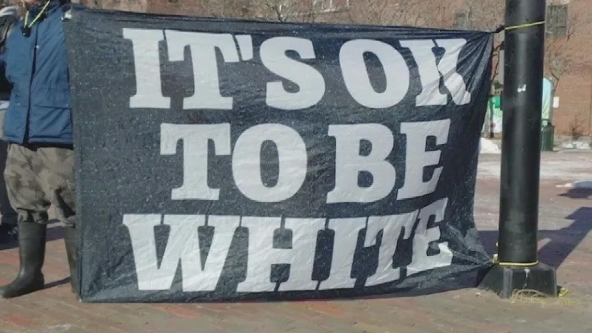 The flag read "It's OK to be white" and was displayed on the first day of Black History Month.