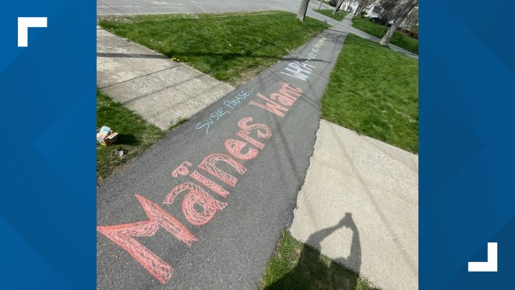 Reproductive rights message written in chalk outside Sen. Collins' Bangor home
