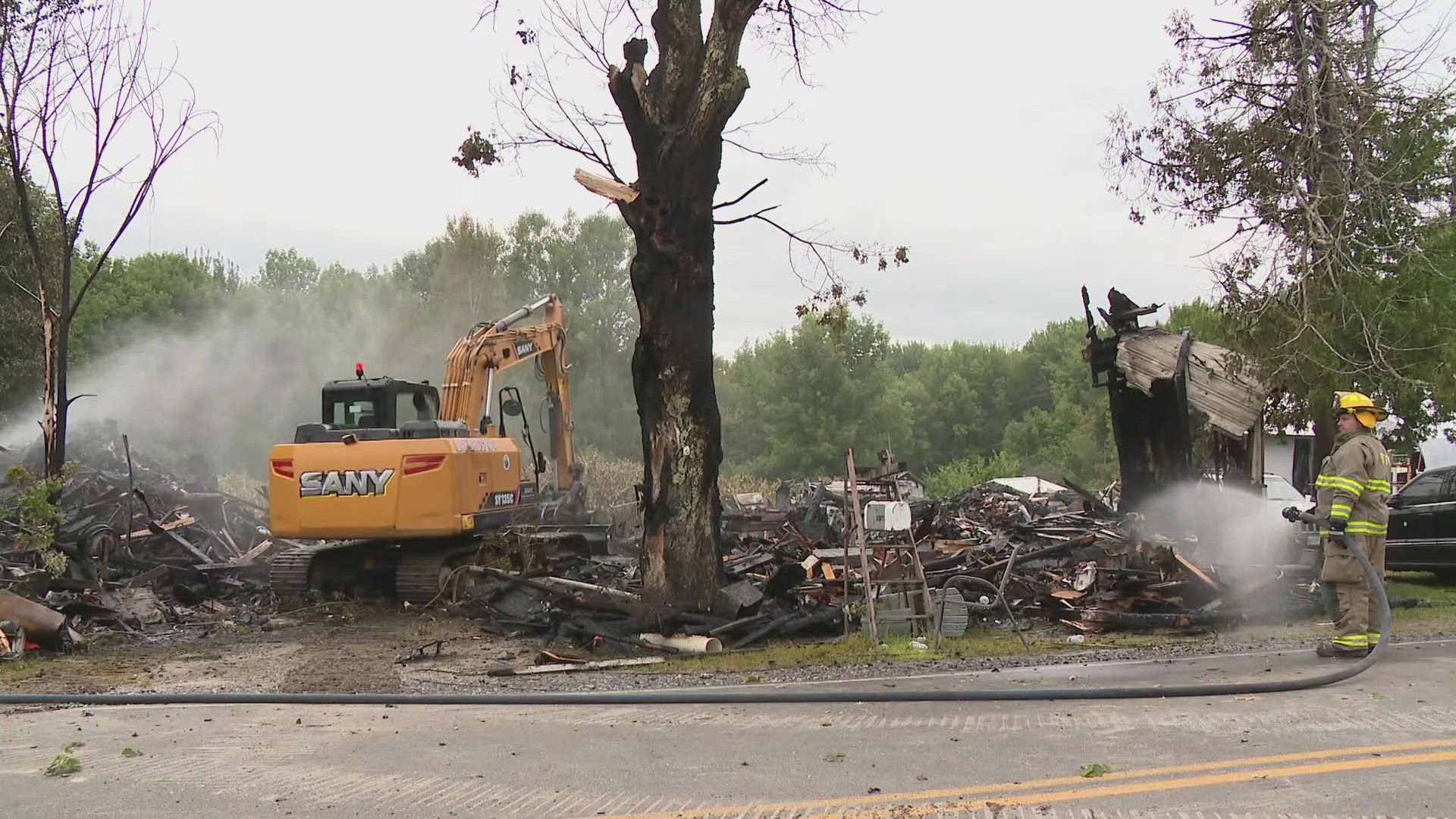 Firefighters found two bodies Monday following a house fire on Route 121 in Otisfield.