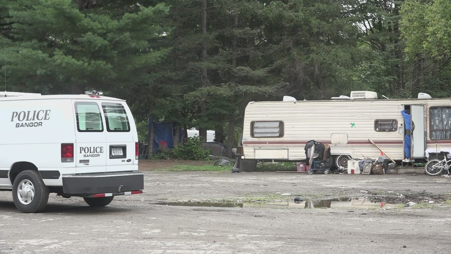 Police carried out a search warrant of an RV parked at the homeless encampment known as Camp Hope on Thursday, which led to the arrest of two individuals.