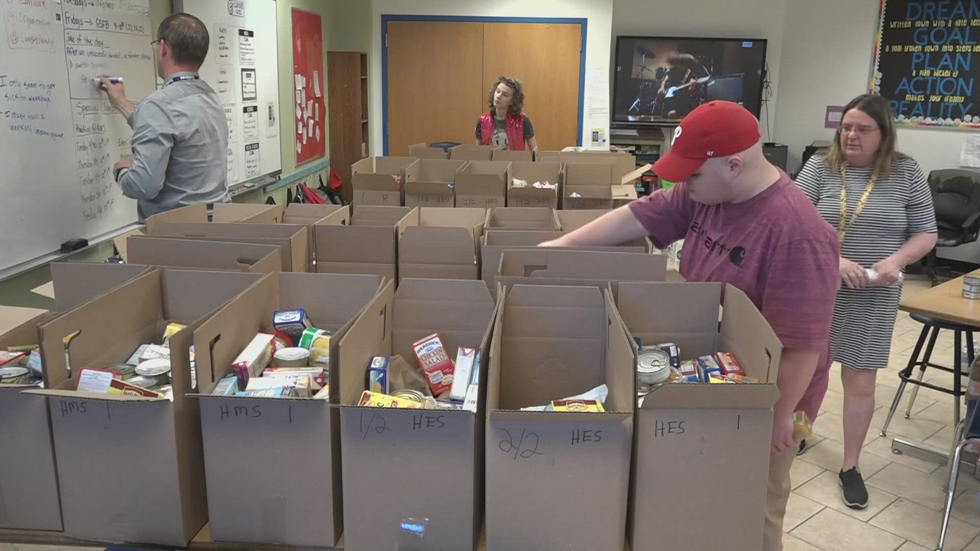 Students at the high school helped fill boxes from Good Shepherd Food Bank and would distribute about 30 of those boxes each week to families three local schools.