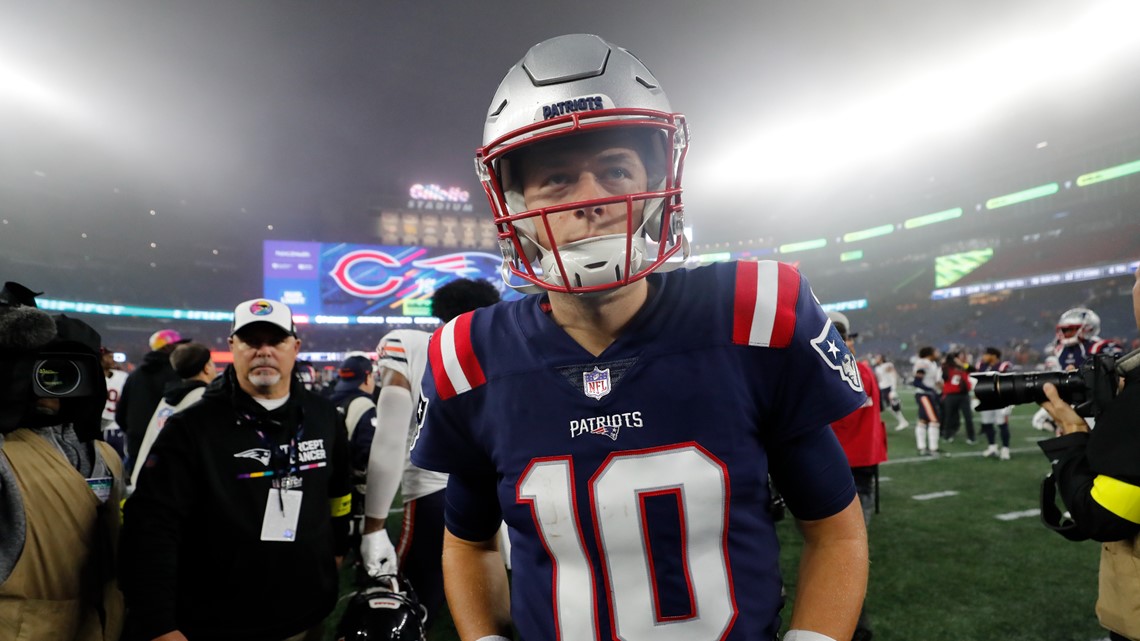 AFC quarterback's Mac Jones of the New England Patriots (10), left