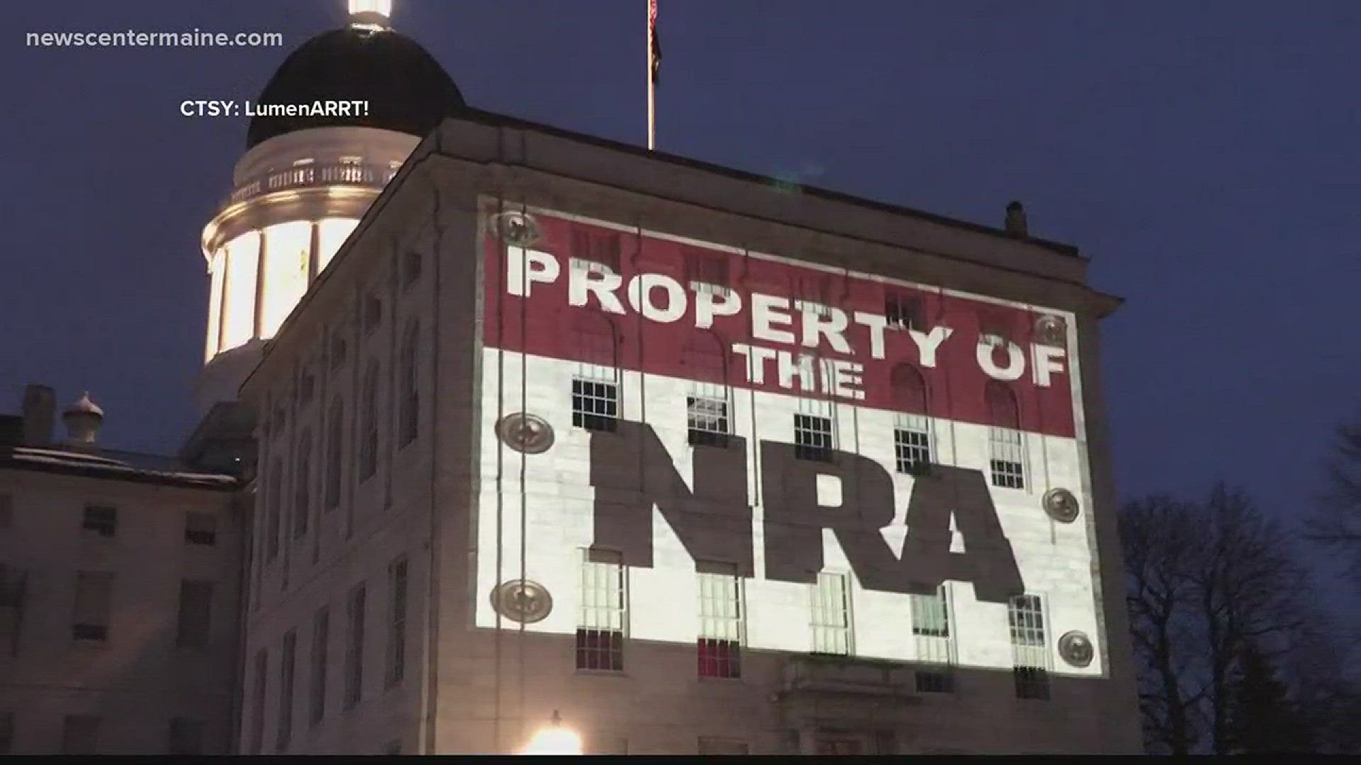 "Property of the NRA" projected onto Maine State House