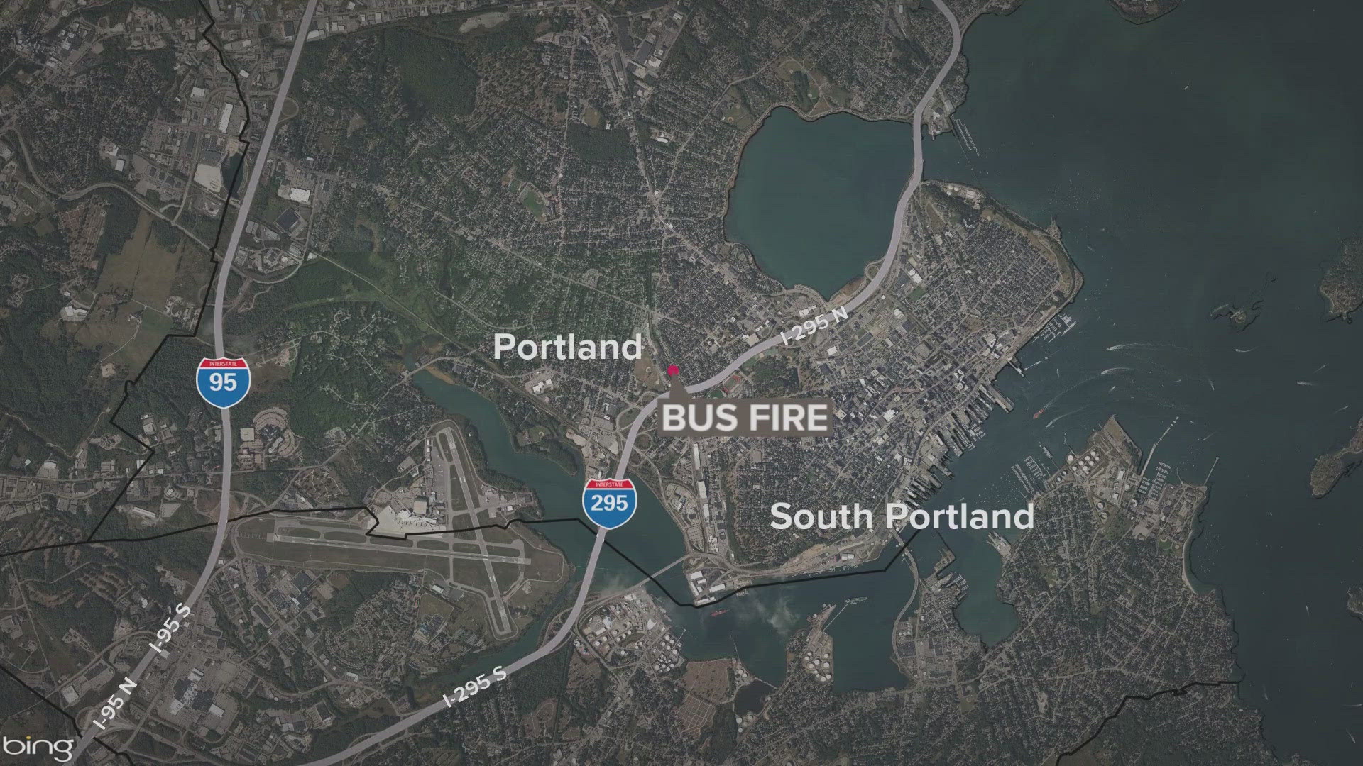 Two antique buses caught fire in Portland, damaging a nearby building. The state fire marshal is now investigating the cause.