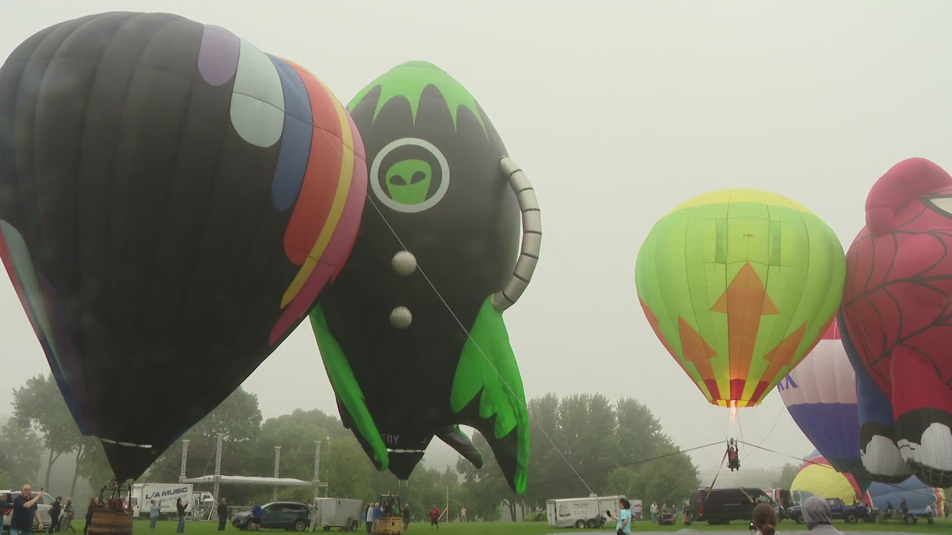 It wasn't a washout, but the weather didn't fully cooperate Friday morning for the kick-off of the Lewiston-Auburn Balloon Festival in Simard-Payne Memorial Park.