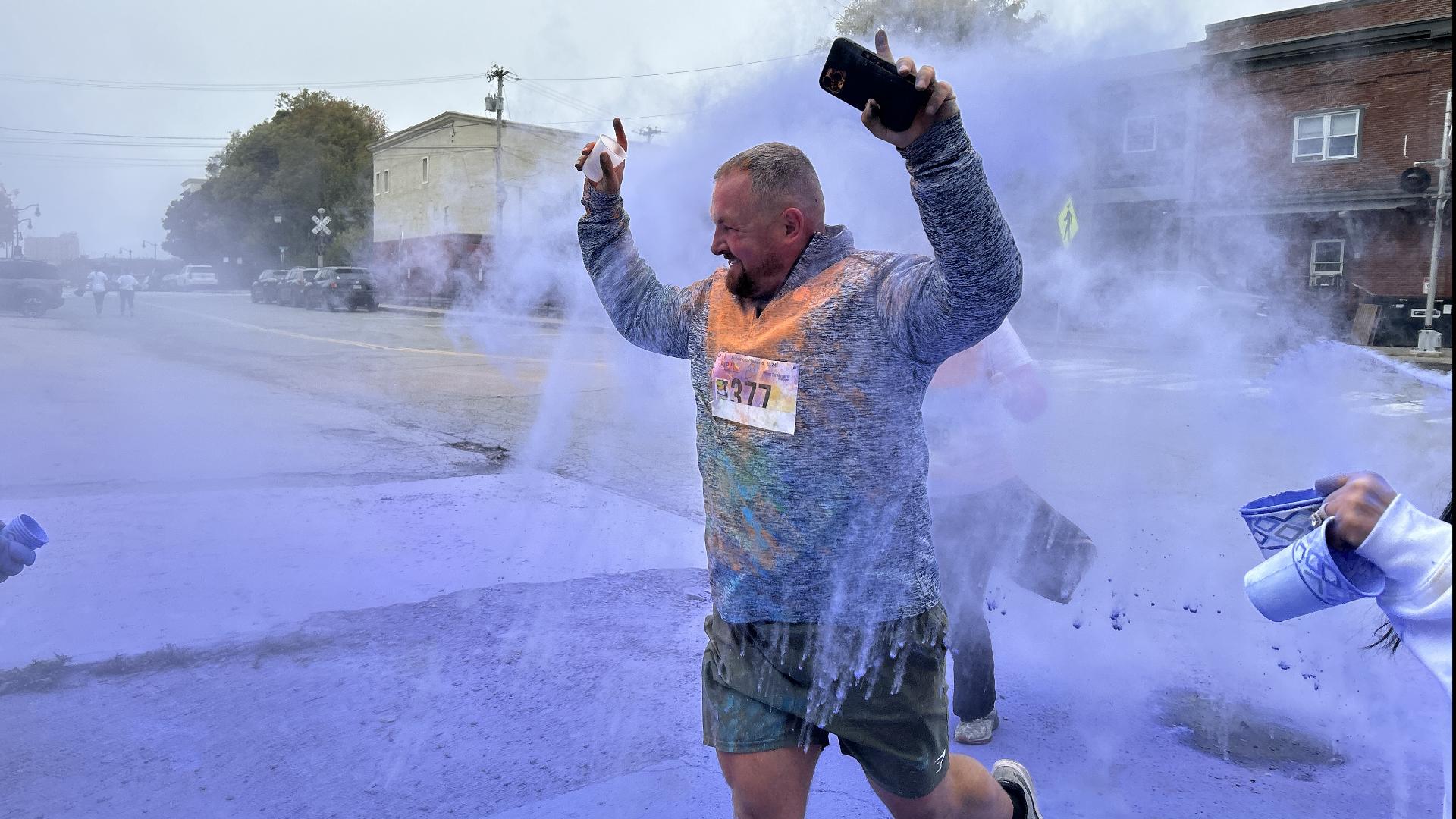 The 12th annual Pound the Pavement to End Cancer color fun run turned participants and Bangor's streets technicolor.