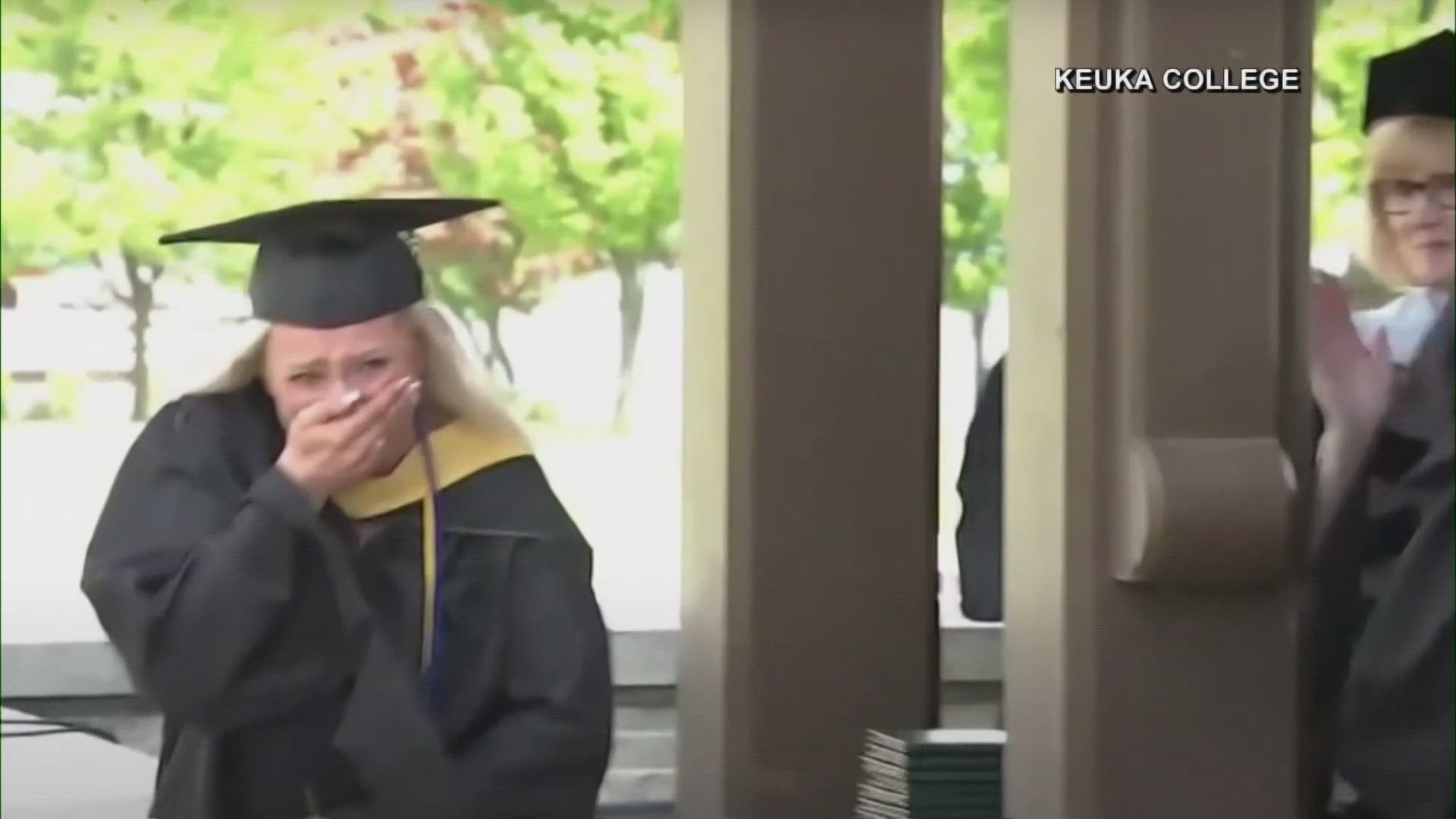 Elizabeth Stewart's baby brother thought he would not be able to attend her college graduation but surprised her instead as she collected her diploma. 