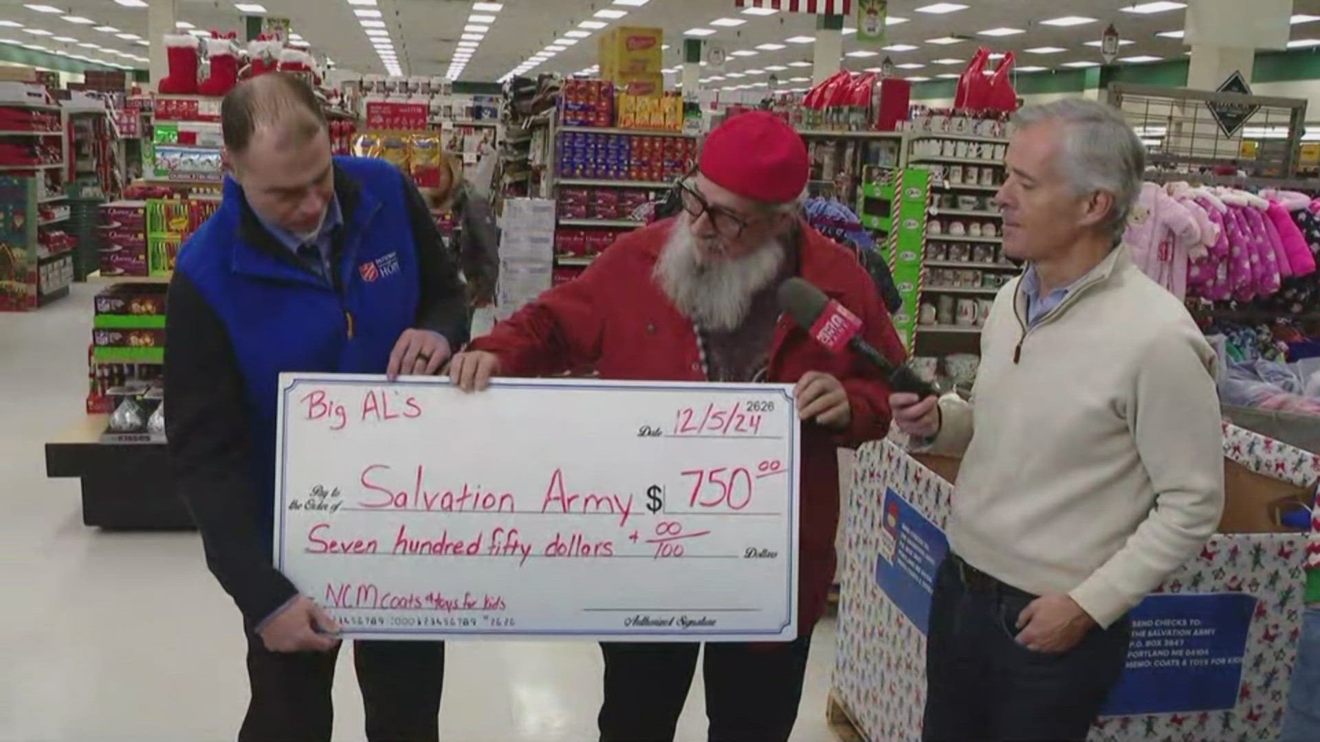 Big Al stopped by our drop-off location at Renys in Topsham to present a check for the Salvation Army.