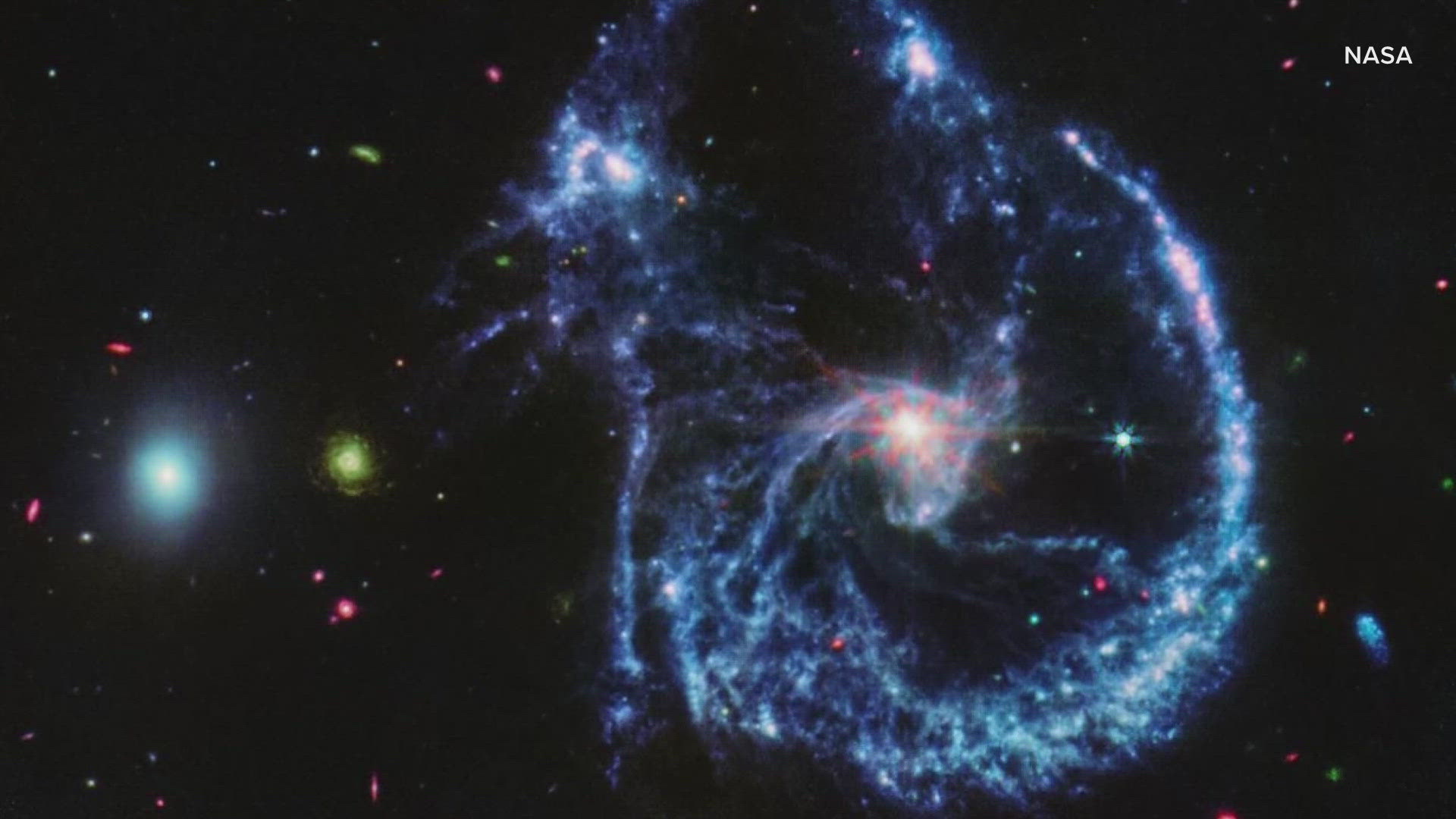 NASA shared a post on its social media page saying the energy it emits as it feeds makes the spiral galaxy's core shine like a six-pointed pink "star."