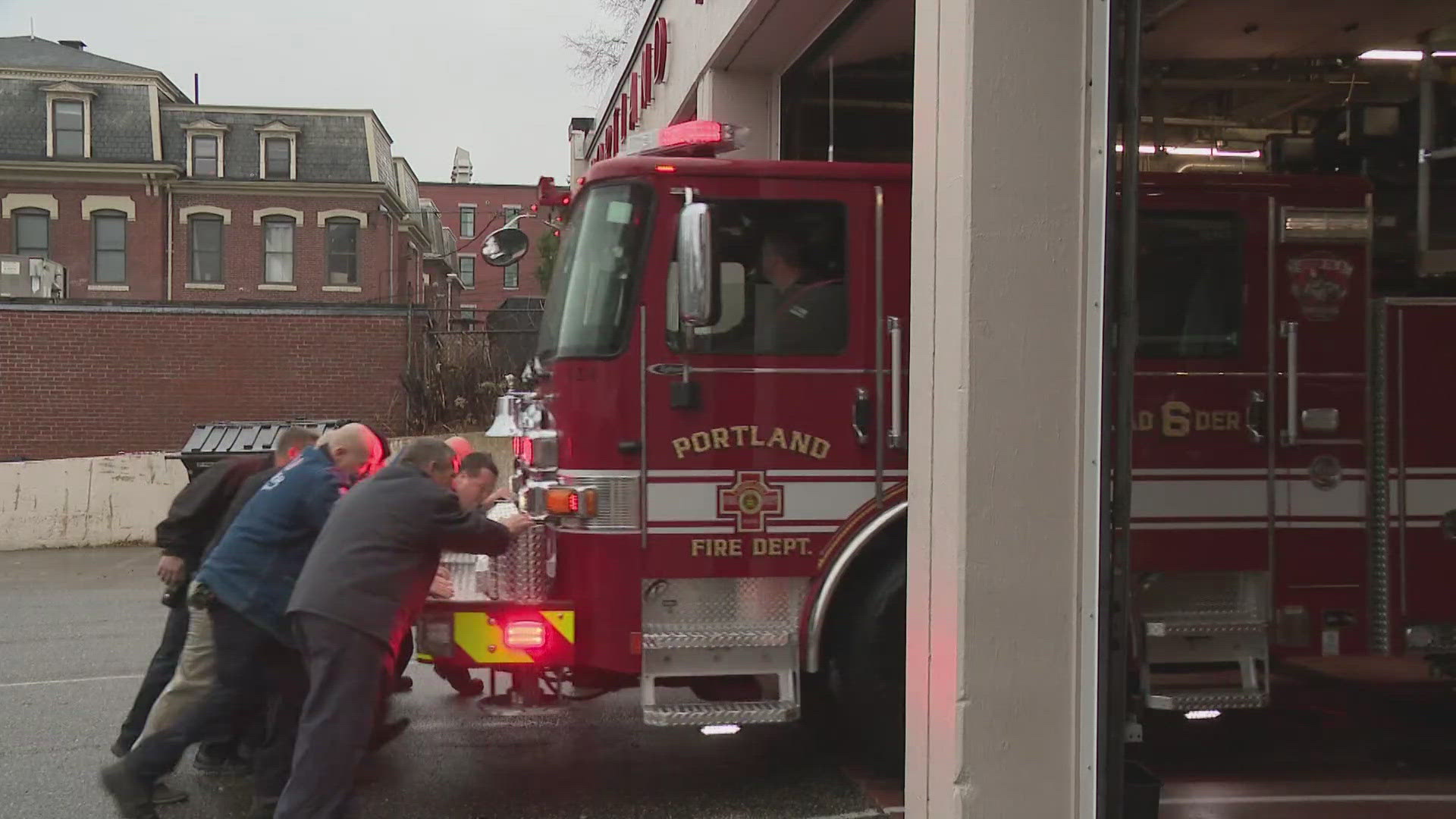 Firefighters at Bramhall Station in Portland "pushed" their new ladder truck into the firehouse, which is an old tradition dating back to horse-drawn carriages.