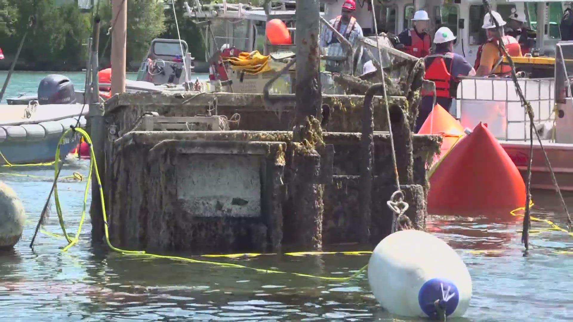 Local crews and the U.S. Coast Guard are working to remove the Jacob Pike, a historic sardine ship that sank to the bottom of New Meadows River in a winter storm.