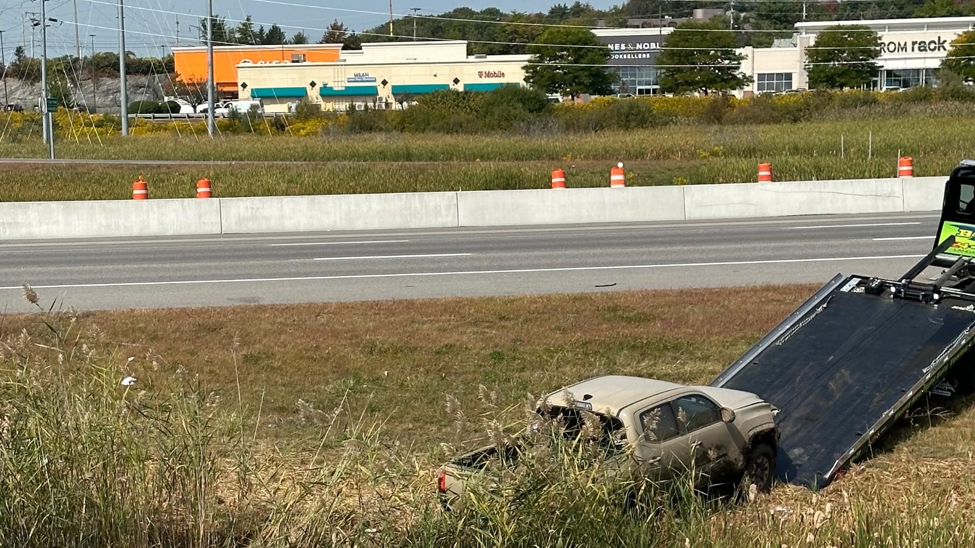 A man from Portland was taken into custody Wednesday after he crashed on Interstate 95 in South Portland and then took off on foot with his dog.