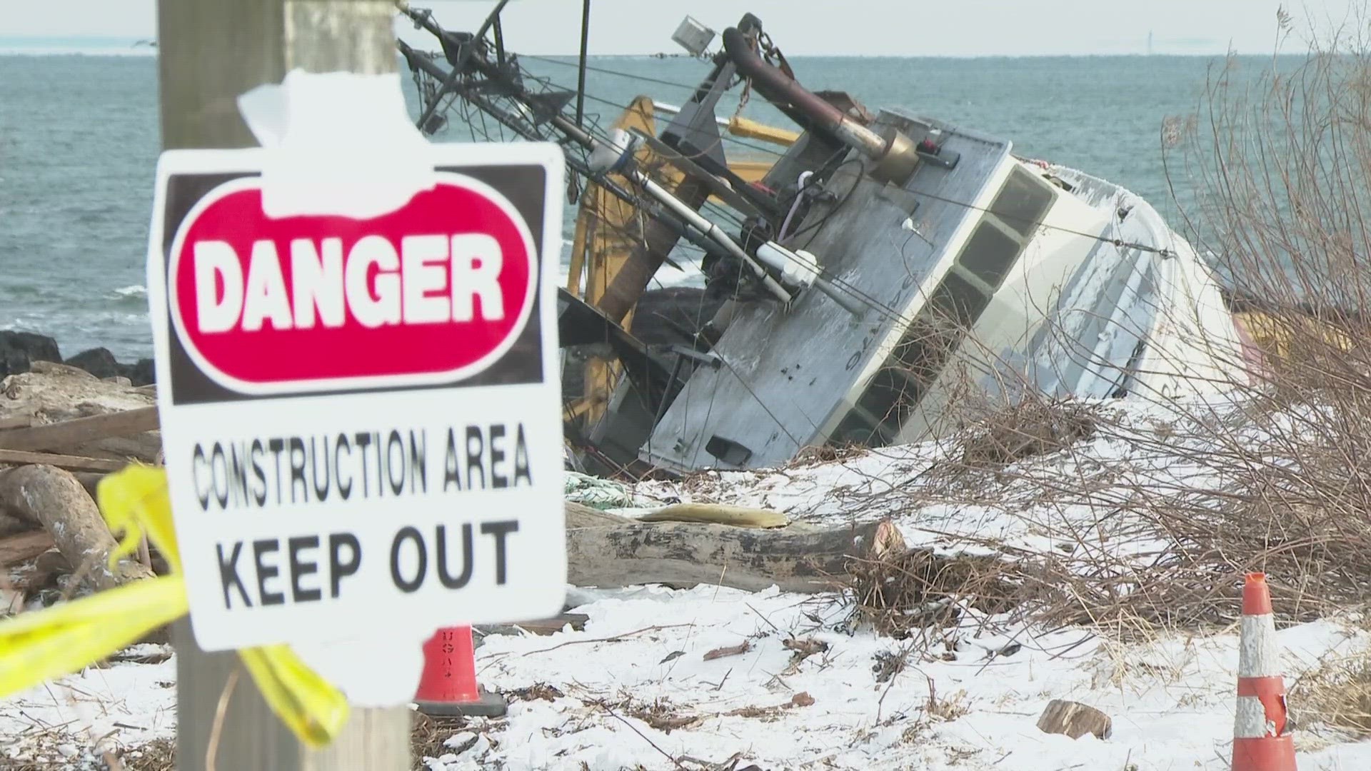 Crews worked Friday to get what was left of the boat out of the water.