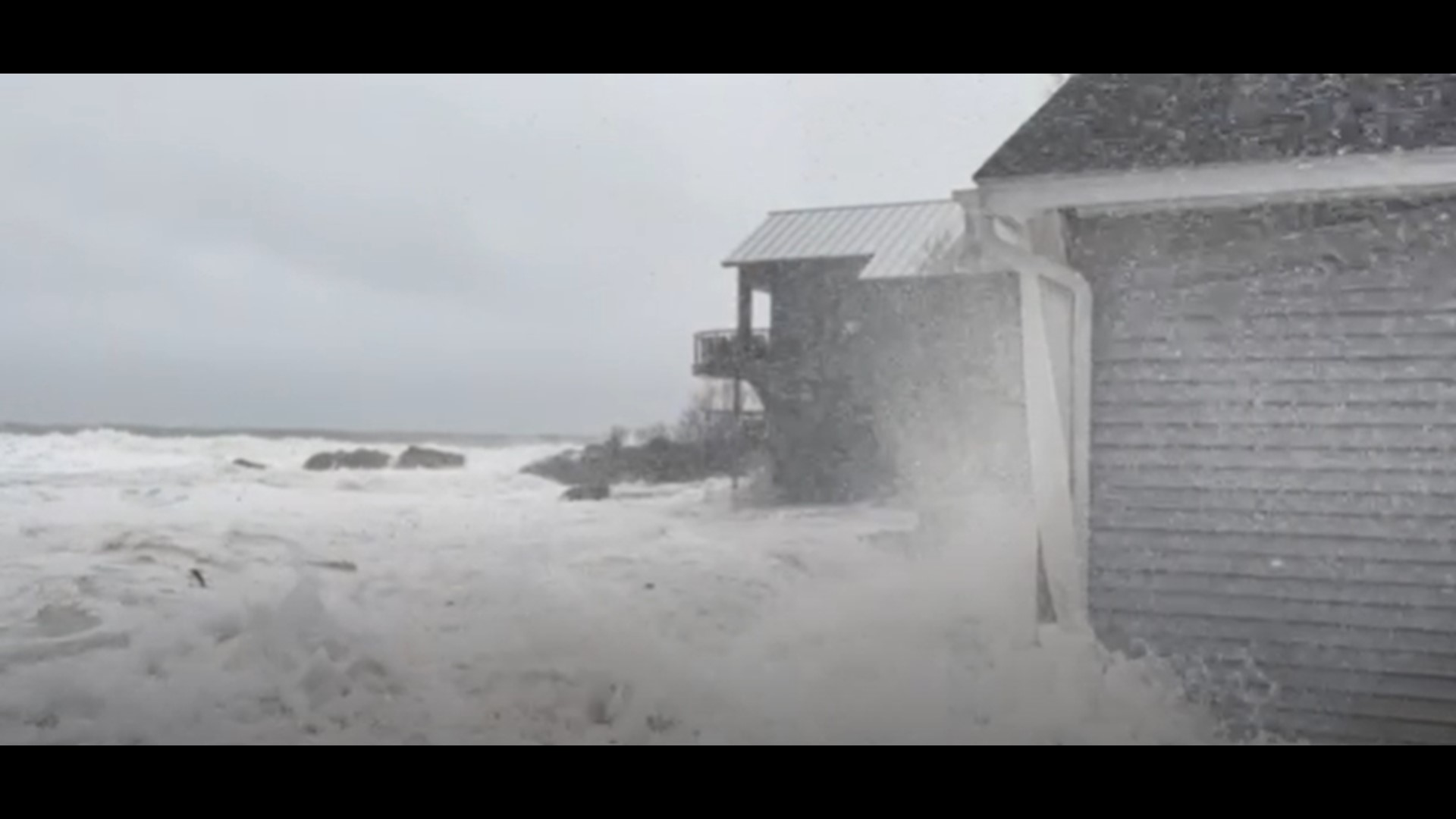 Waves impacted homes in Cape Elizabeth during the storm Saturday.