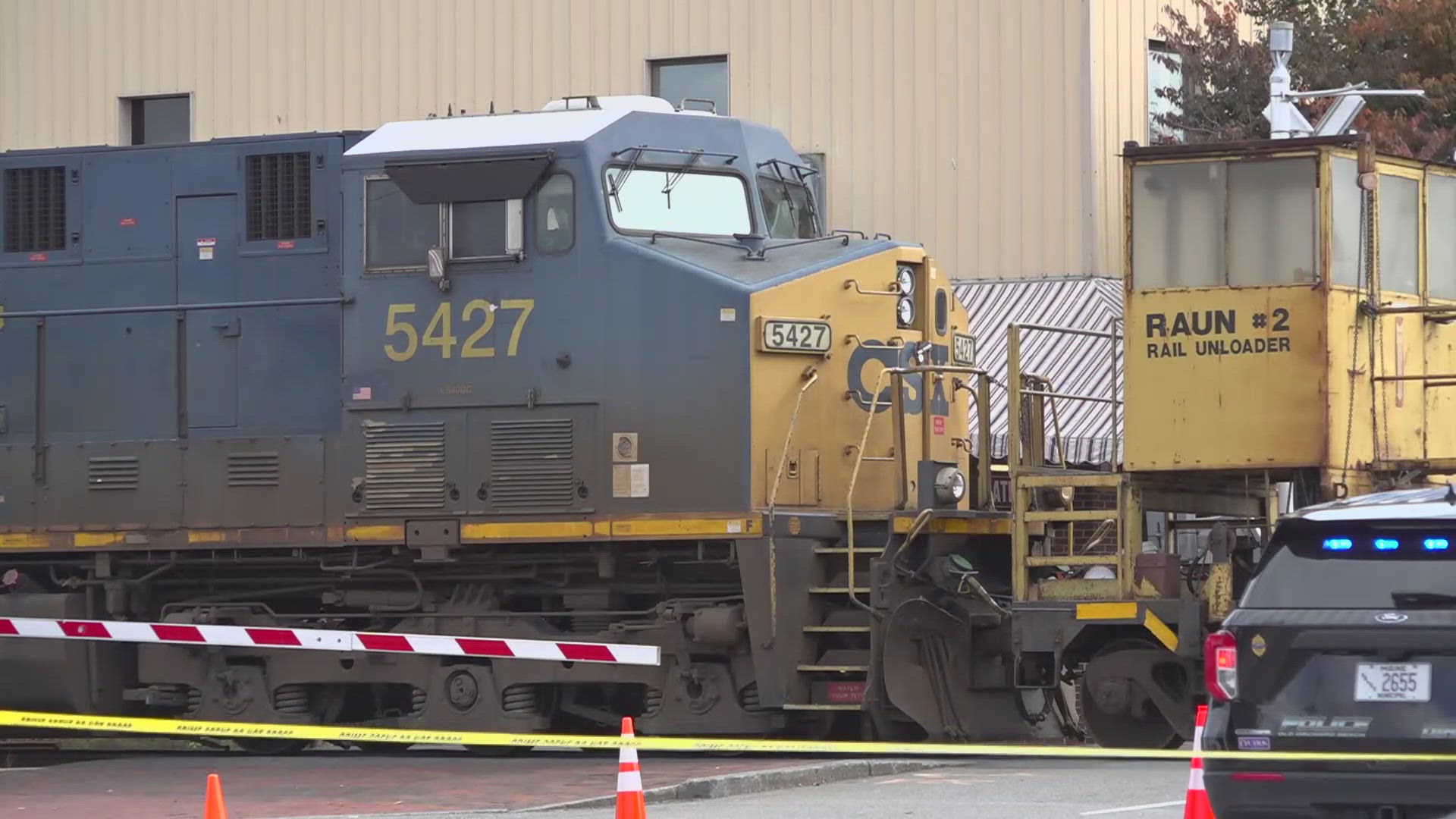 The incident closed several roads in the area while the train was stopped on the tracks.