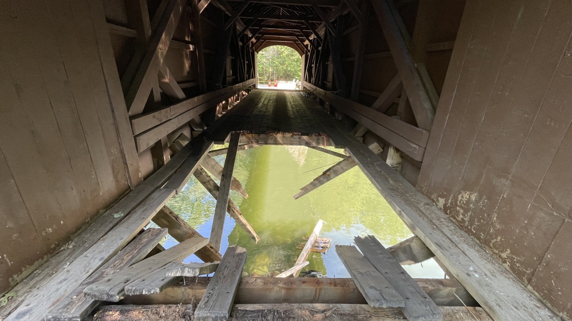Truck drops through historic covered bridge at GorhamWindham line