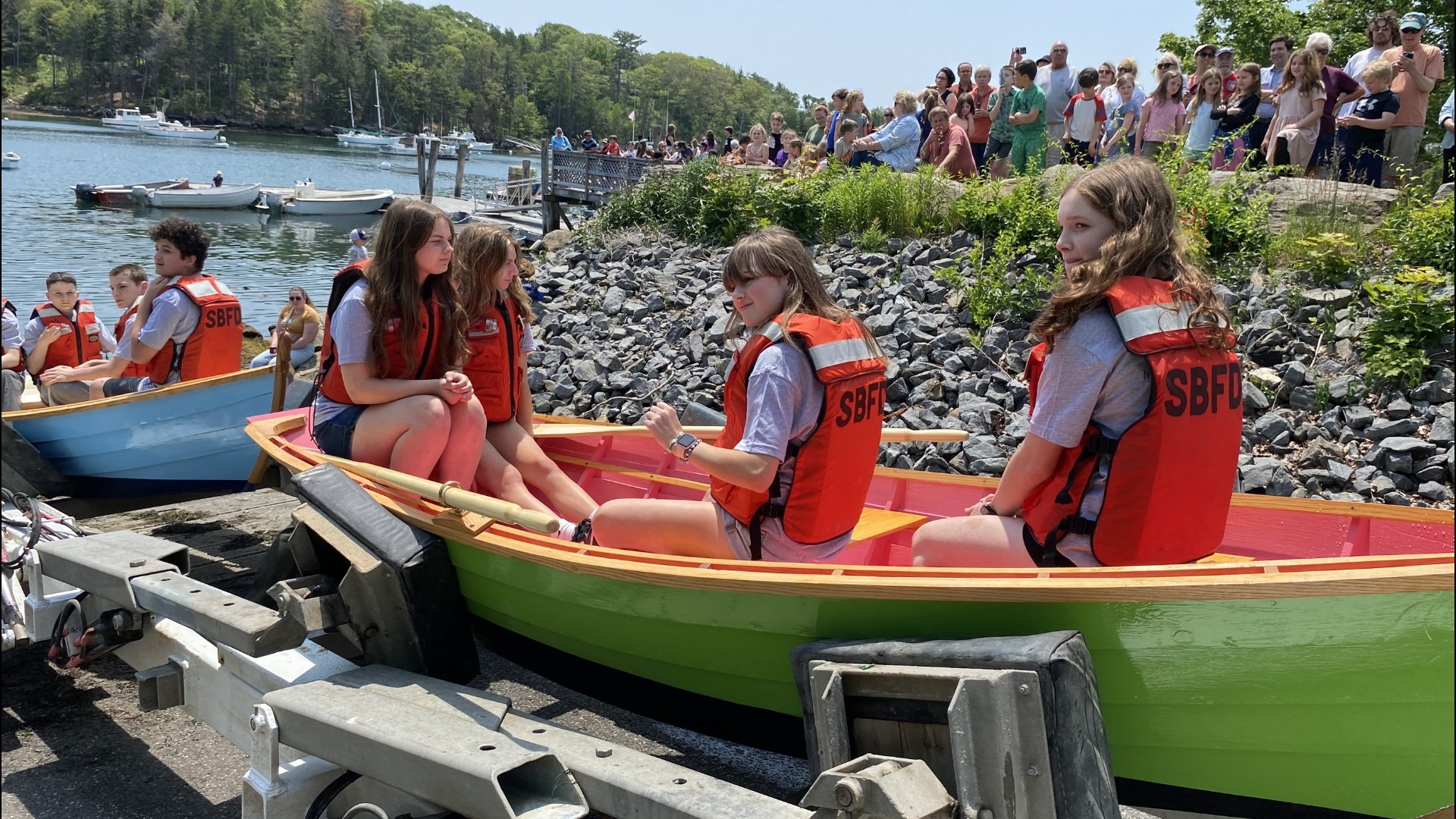 A group of graduating eighth-graders in South Bristol learn hands-on boatbuilding skills. The class worked to build skiffs throughout the year.