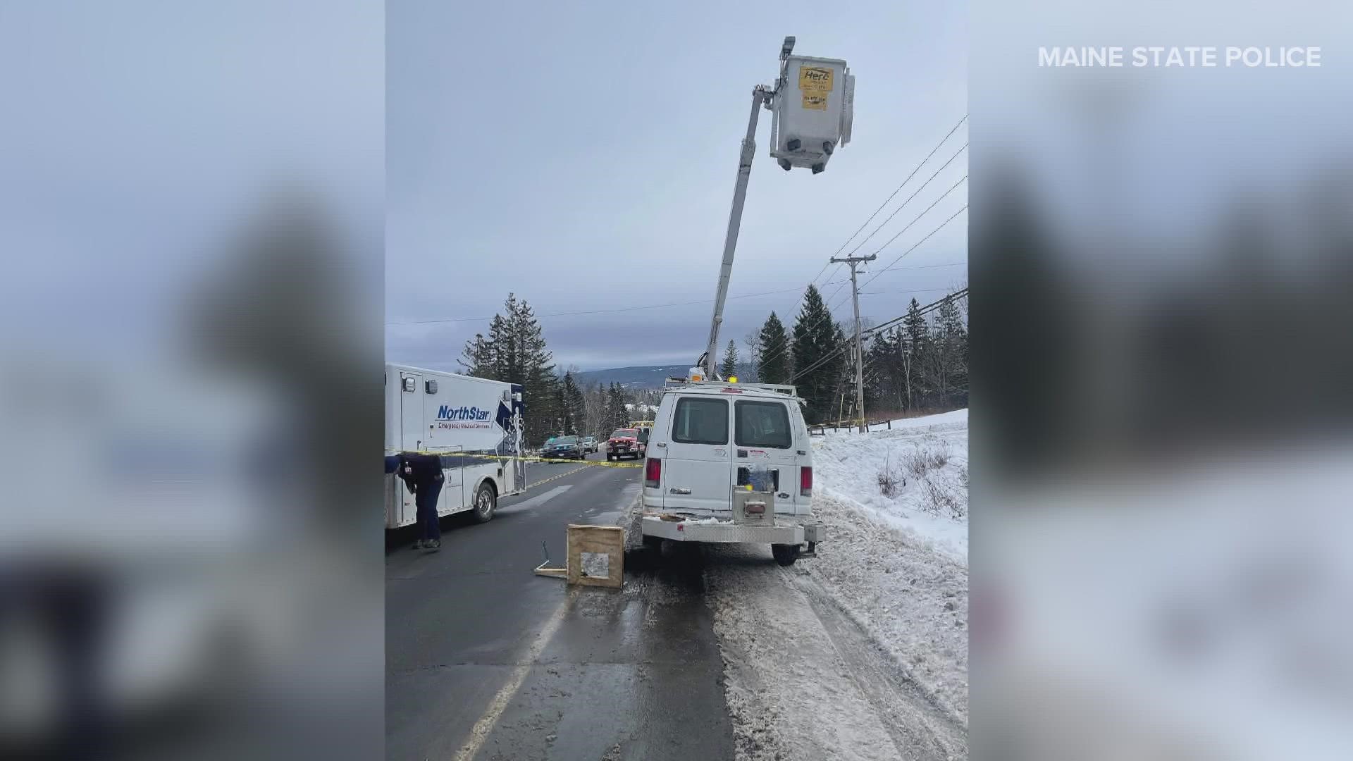 The bucket struck a set of utility wires suspended by utility poles across the roadway, according to a news release.