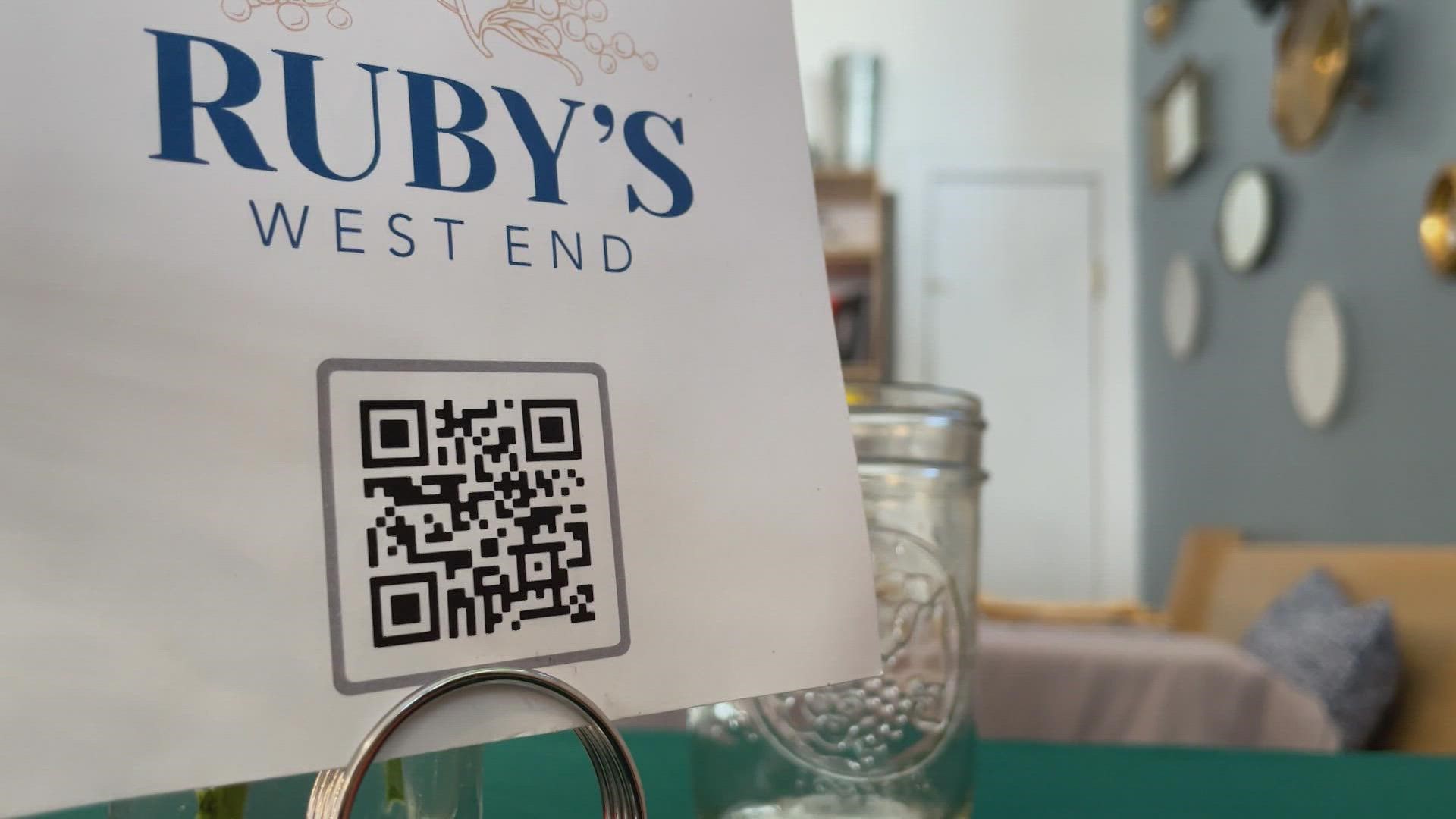 Ruby's West End owner Corrinna Stum has decided to forego some mainstays of the restaurant industry like paper menus and dry-cleaning to raise pay for her employees.