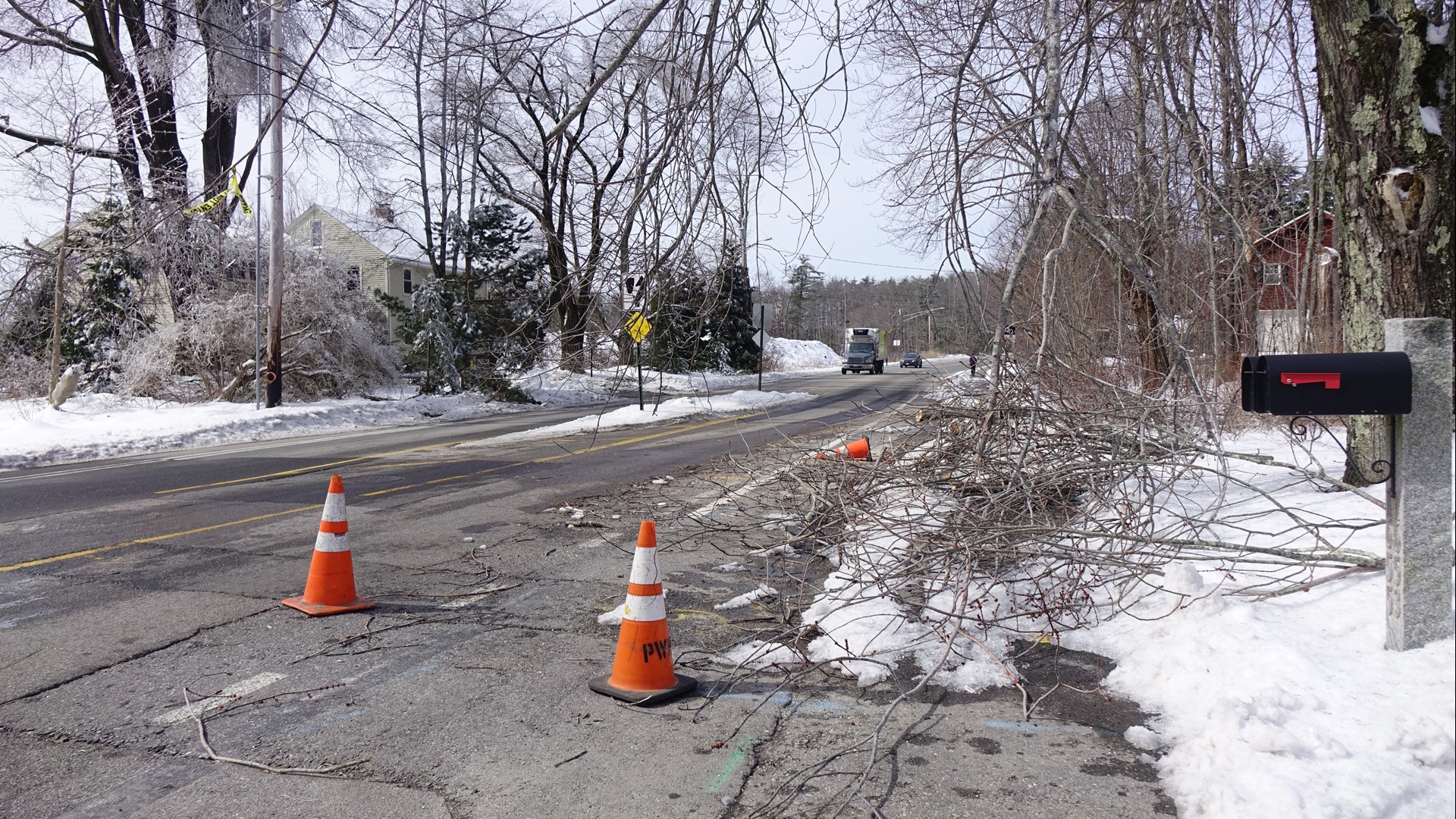 Debris littered yards and roadways along Stroudwater Street stretching the Portland and Westbrook town line.