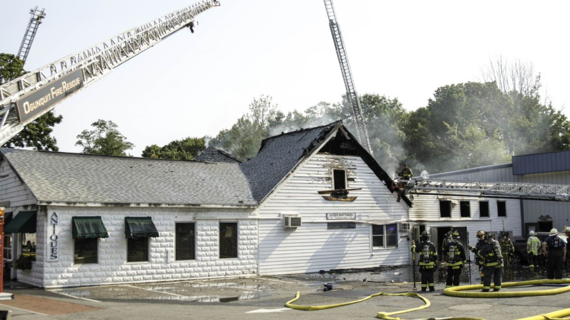 When firefighters arrived around 7:58 a.m., the building at 166 Main St. was engulfed in flames with heavy smoke.