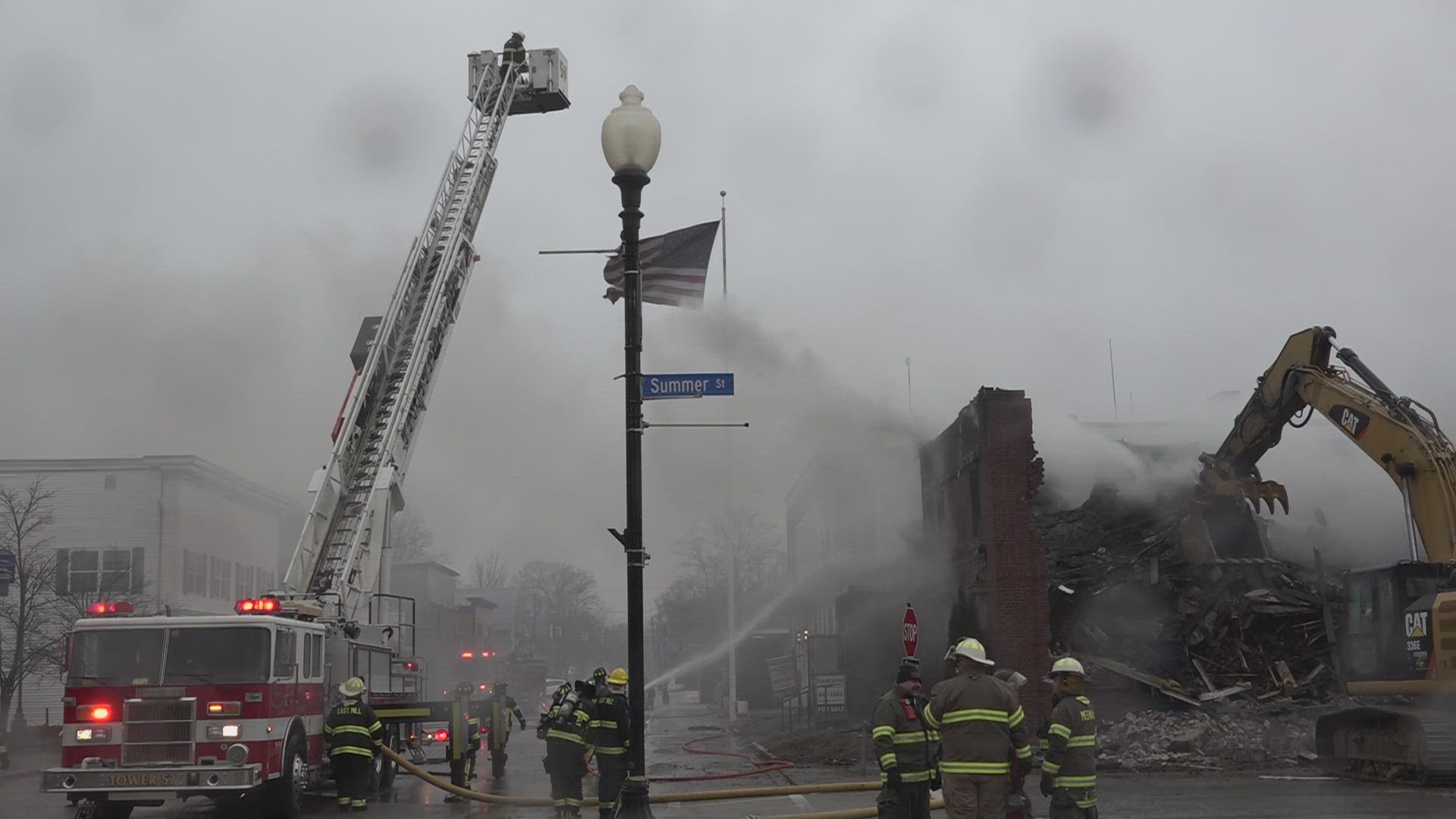 Two firefighters were injured and brought to a local hospital. The building was deemed a total loss.