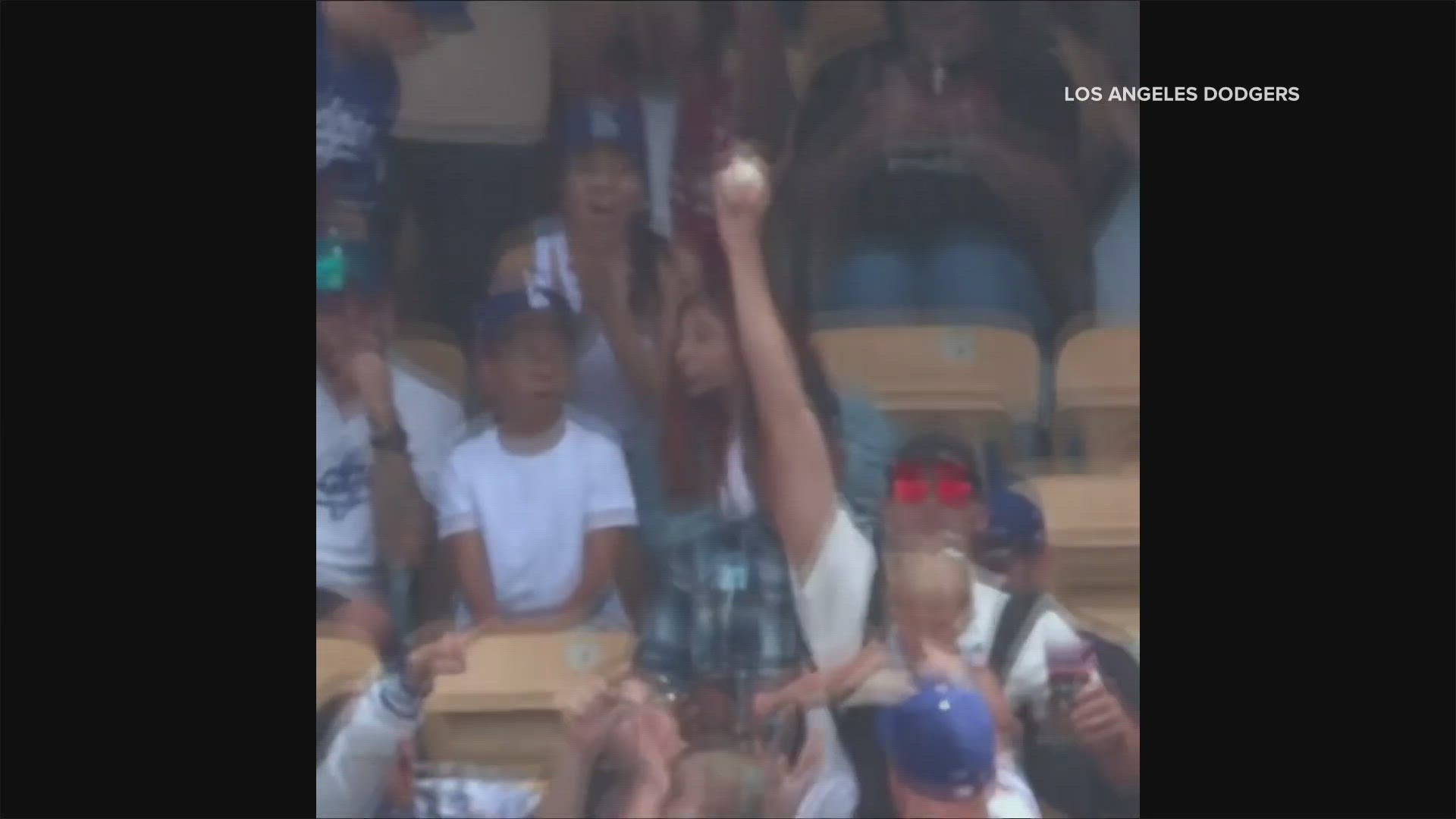 Dodgers Fan Catches Foul Ball While Holding His Baby and a Beer