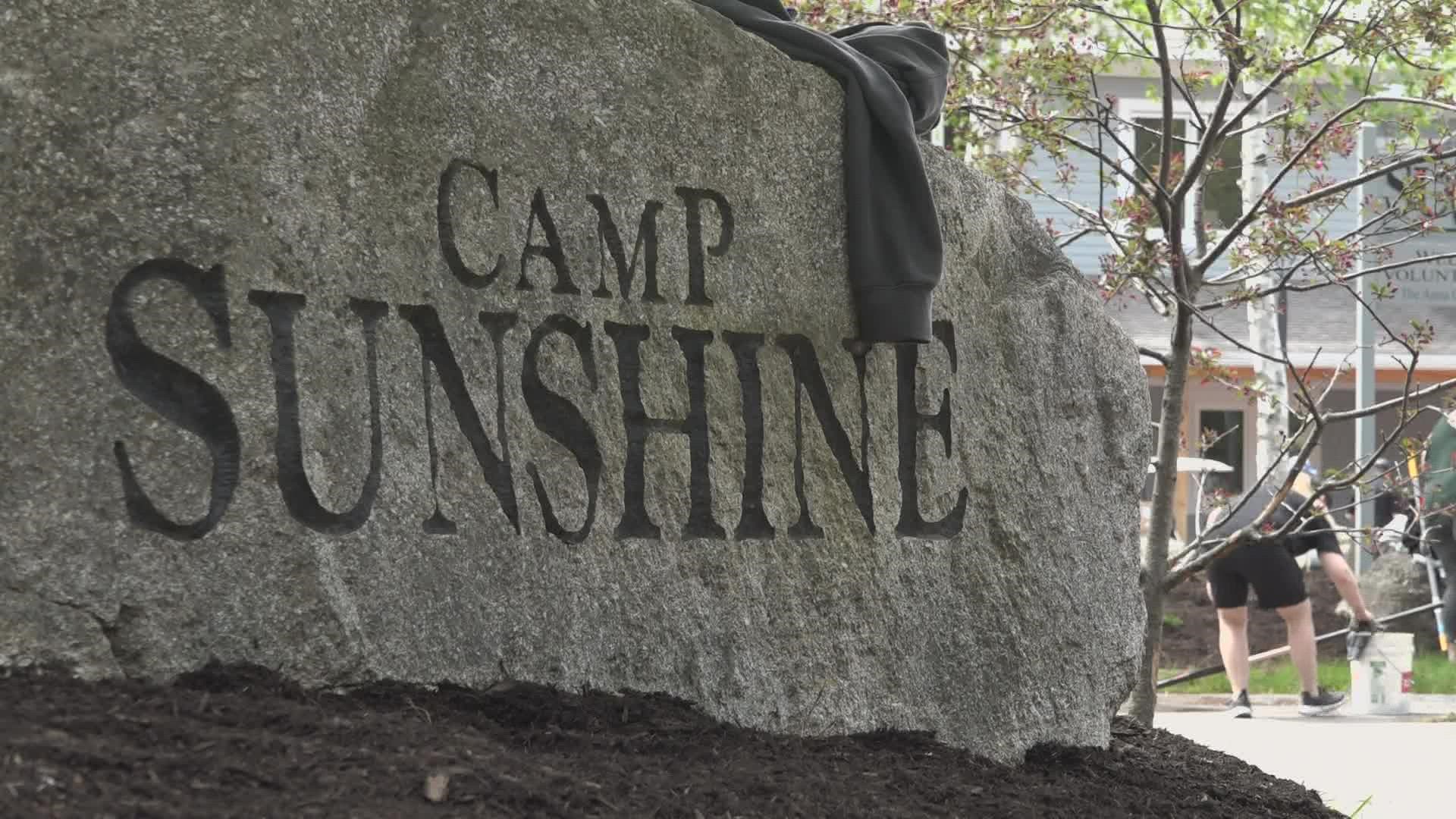 On Monday, 160 volunteers from sponsor Texas Roadhouse visited Camp Sunshine in Casco to clean up the campus and announce a special milestone.