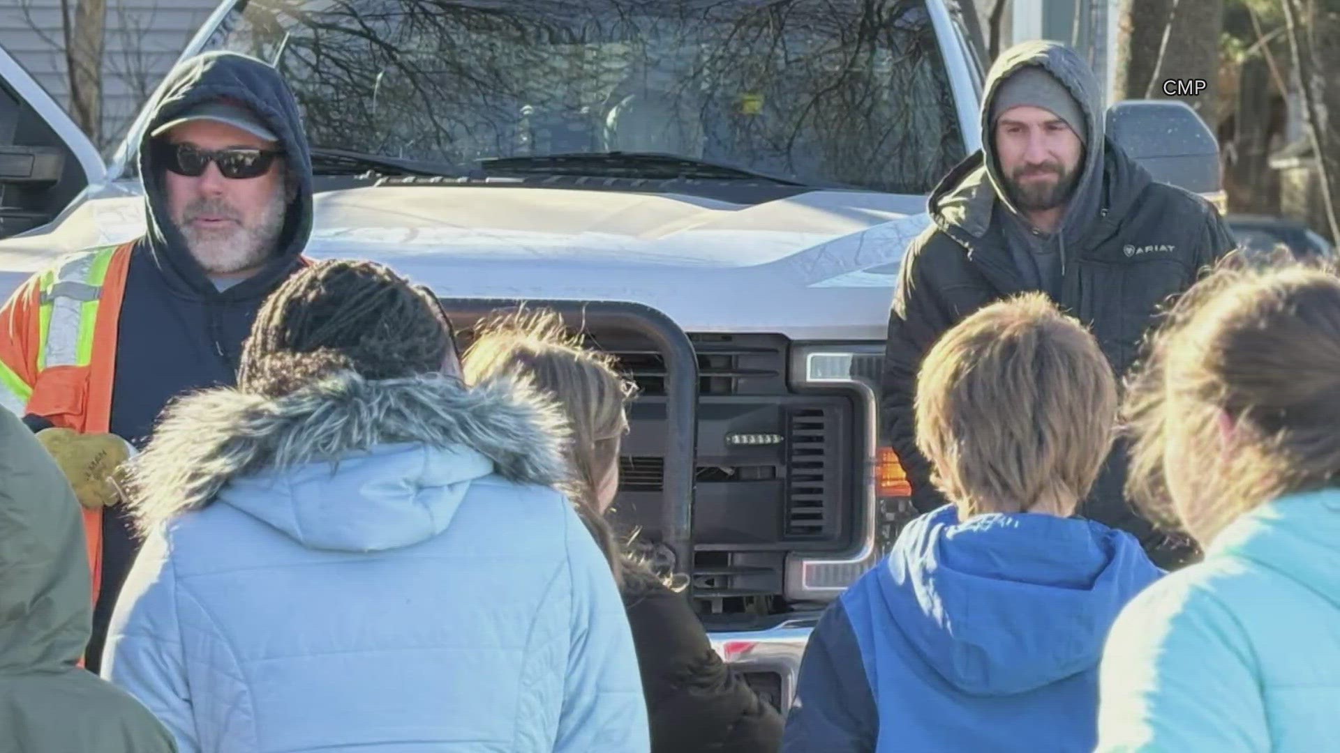 Fourth graders from Winslow Elementary School gave Central Maine Power linemen handmade Christmas cards after the storm this week.