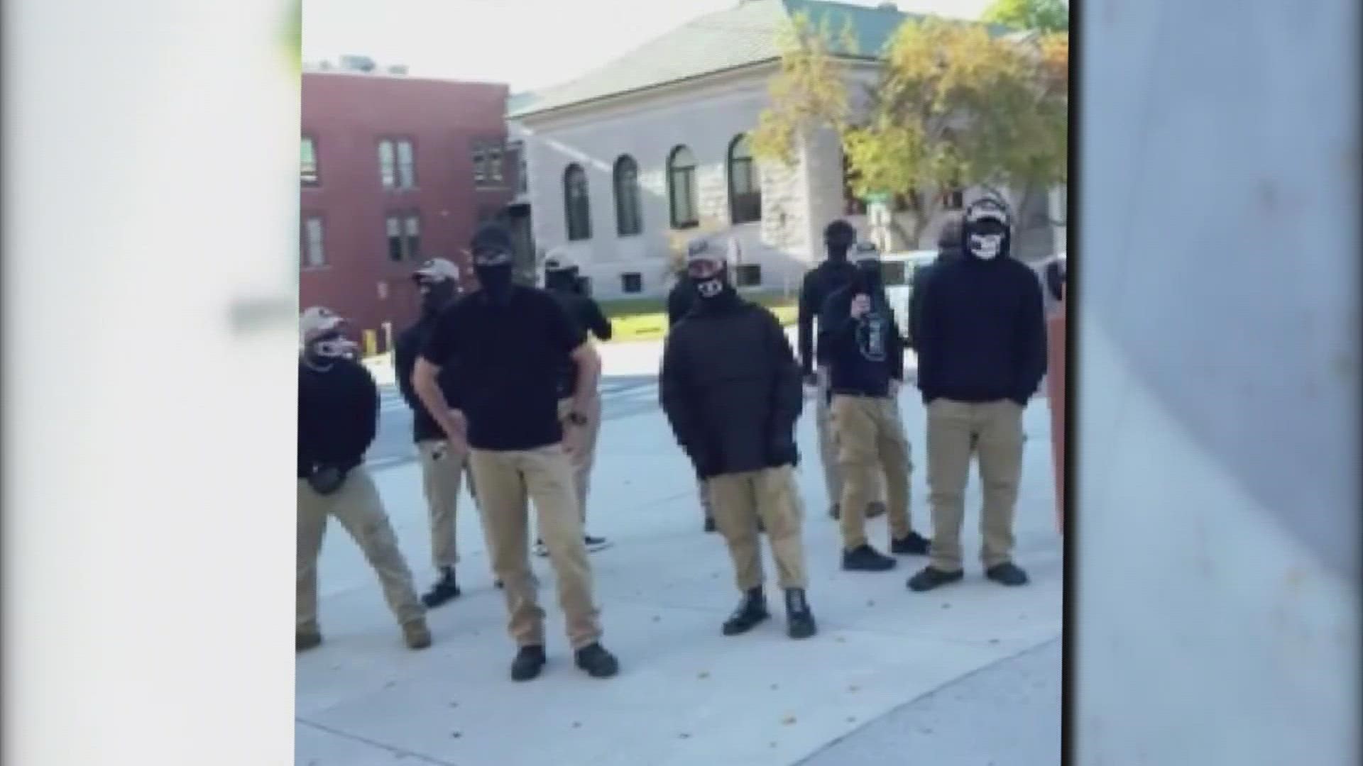 More than 20 people dressed in black marched through the park on Oct. 2. Witnesses said it was an attack on Lewiston's refugee community.