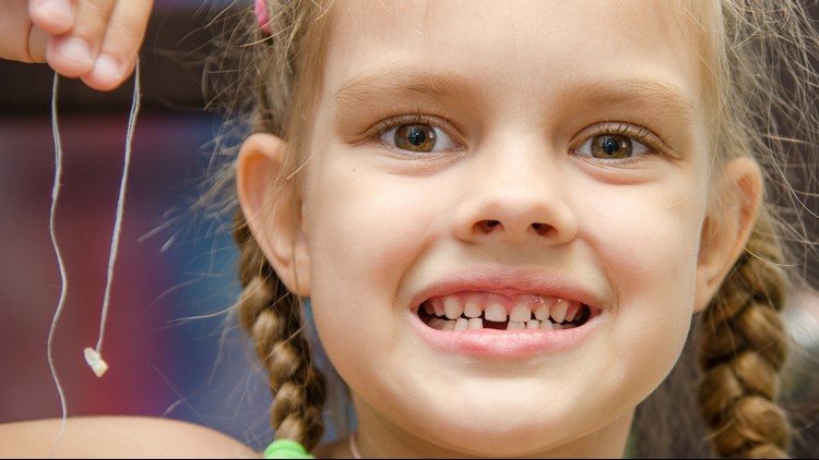 10 epic videos of kids pulling teeth in crazy ways on Tooth Fairy Day