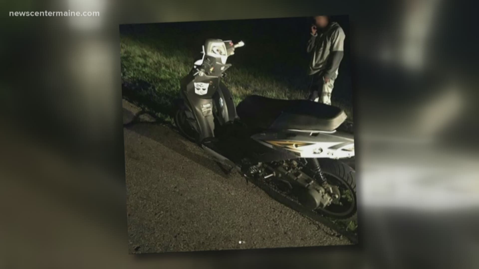 Man caught on highway riding scooter with cell phone as a headlight