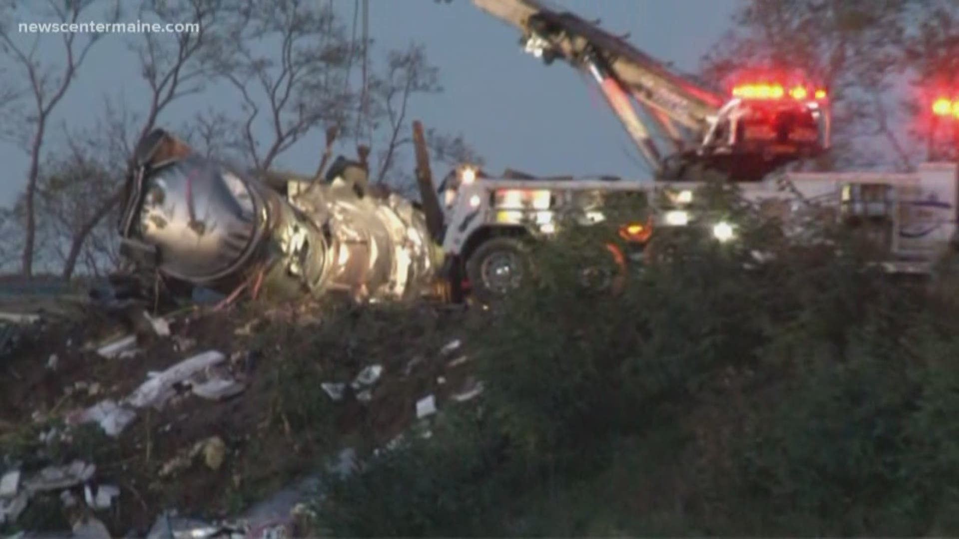 Tanker crashes, rolls off I-295 in Portland