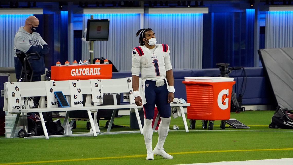 Cam Newton helps Patriots beat Ravens in rain and wind