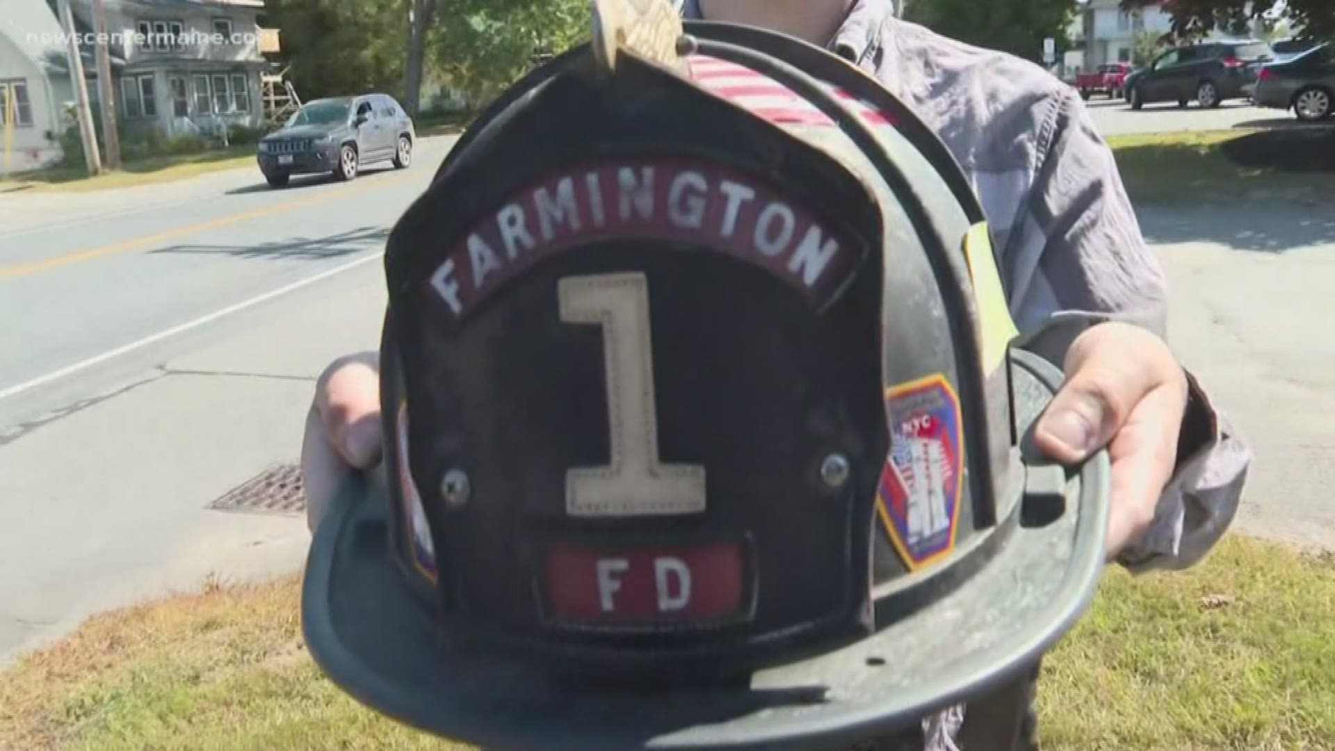 Farmington teen receives fire chief's helmet.