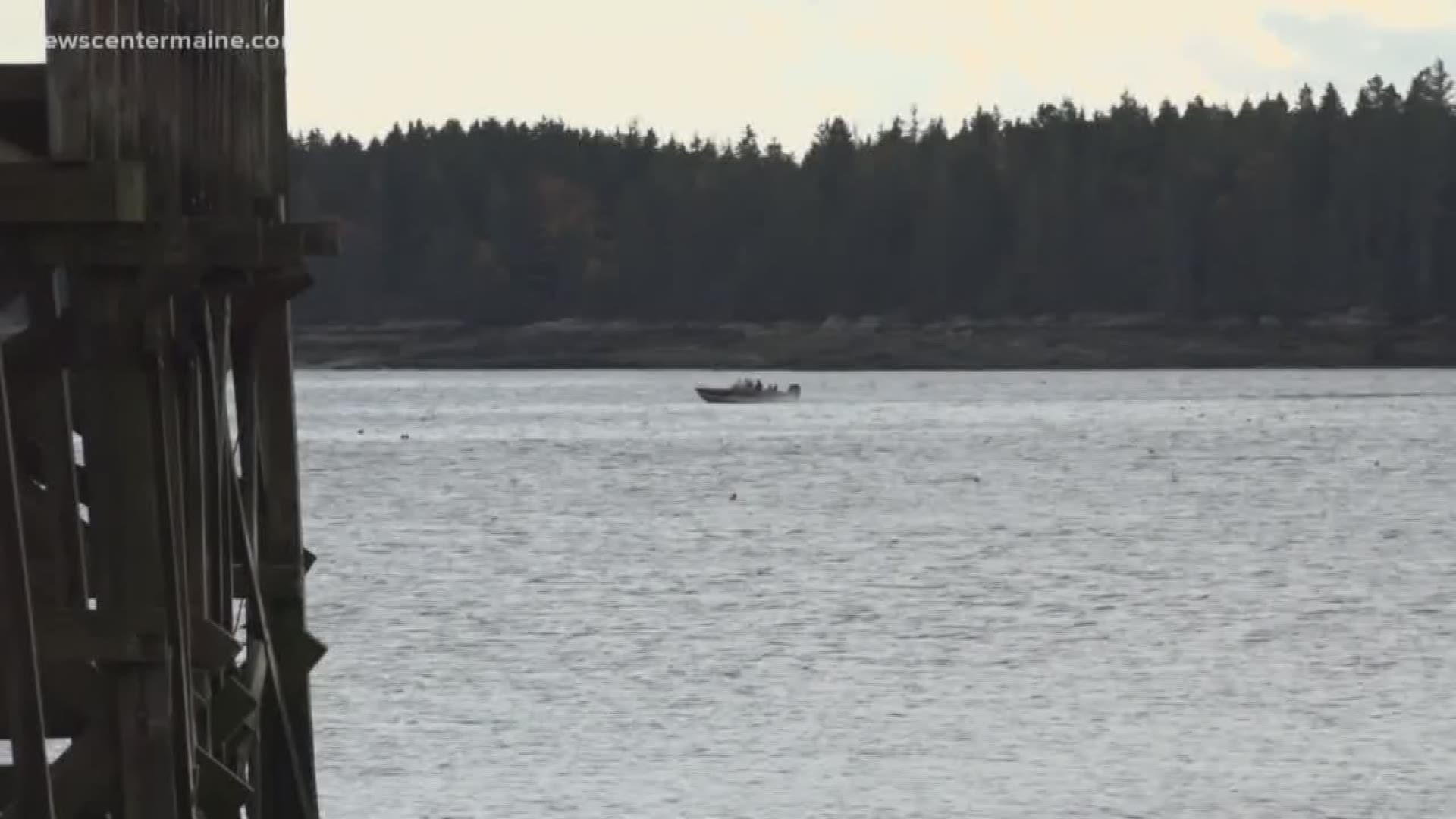 The coast guard says a body has been recovered, and it may be that of a missing fisherman near Doyle Island.
