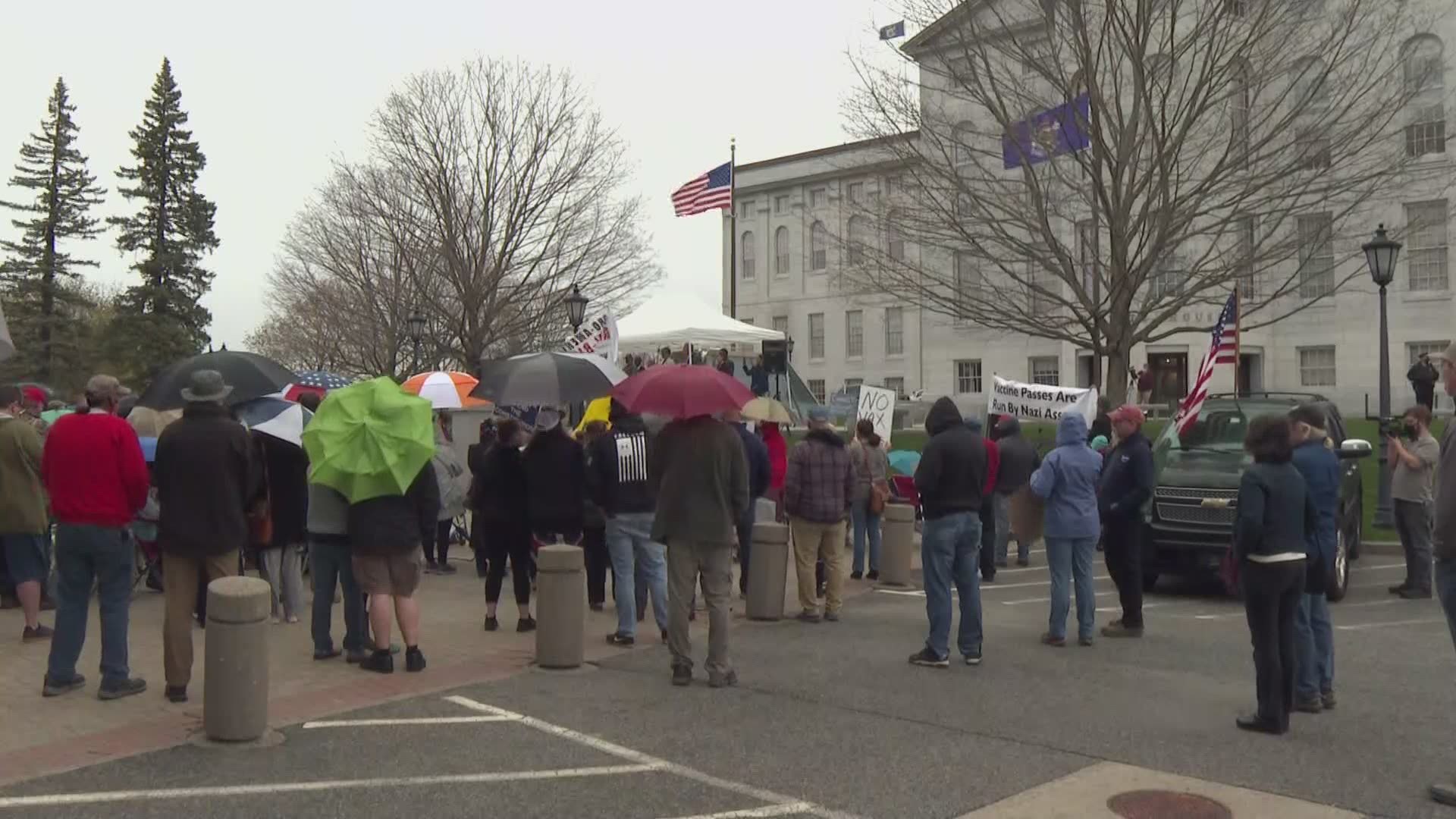 Just one day after Gov. Mills lifted the state's mask mandate, hundreds gathered in Augusta - demanding more.