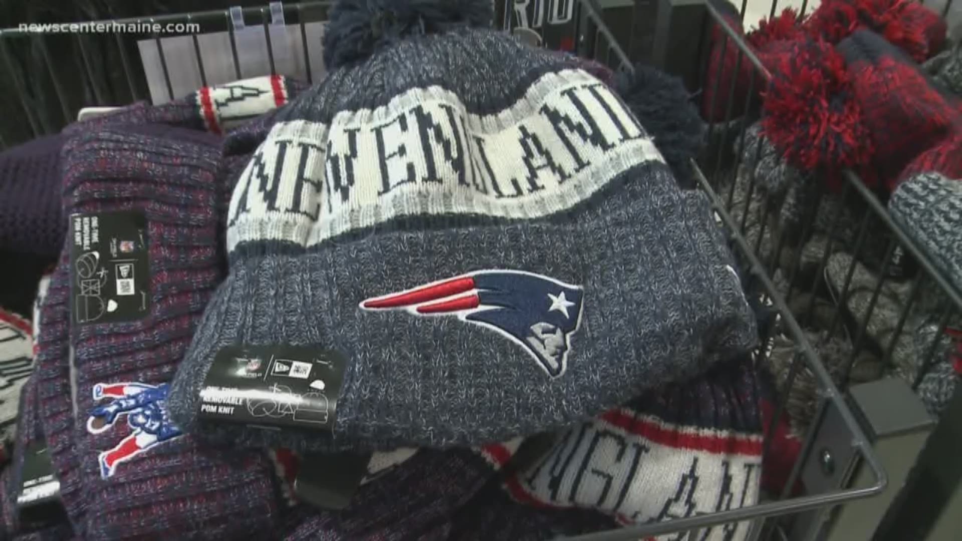 New England Patriots fans stock up on AFC gear after the team's win in Sunday night's game against the Kansas City Chiefs.