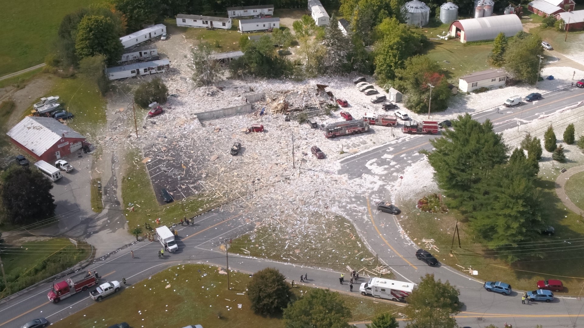 Bird's-eye view of the rubble left in Farmington, Maine, after a building exploded Monday morning, killing one firefighter and injuring several others.