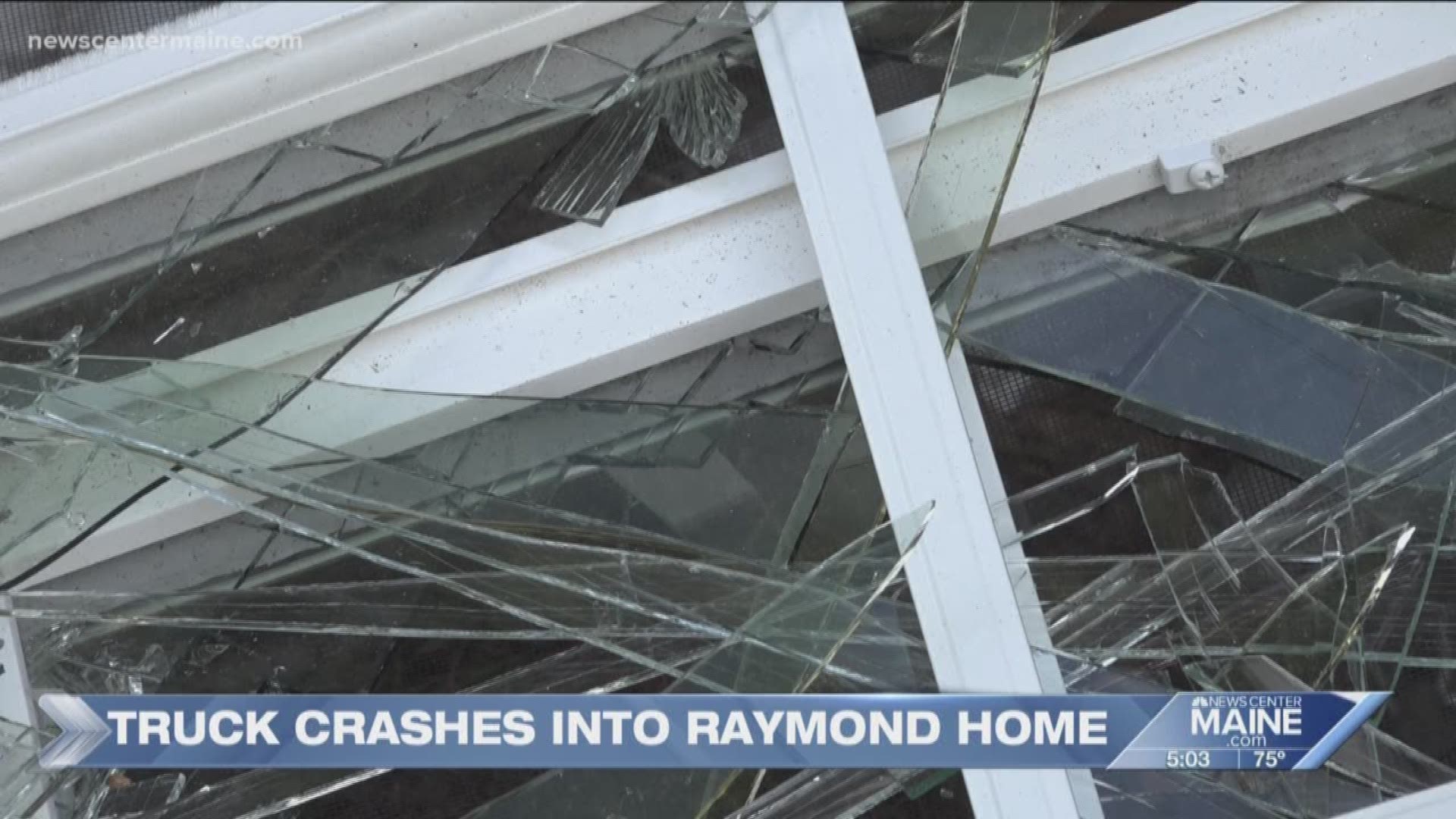 Truck crashes into home in Raymond