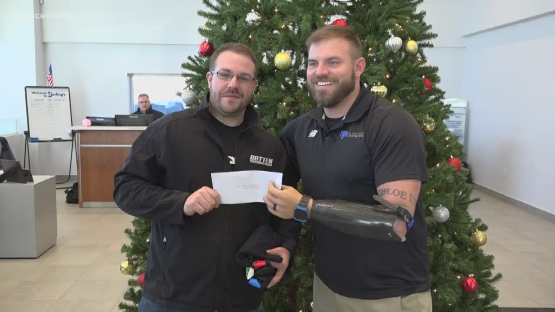 The Travis Mills foundation -- which helps wounded warriors and their families -- received a check from coastal mustang cruise and darling's ford in Bangor for more 13- thousand dollars.