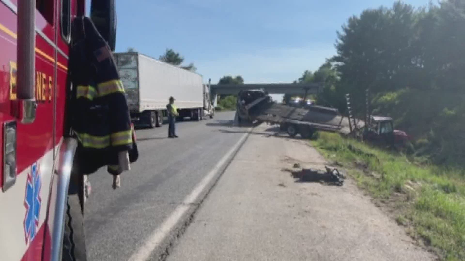 According to police, more than a dozen people stopped on I-95 to help Wesley Donnellan out of his truck after he lost control and jack-knifed into a ditch.