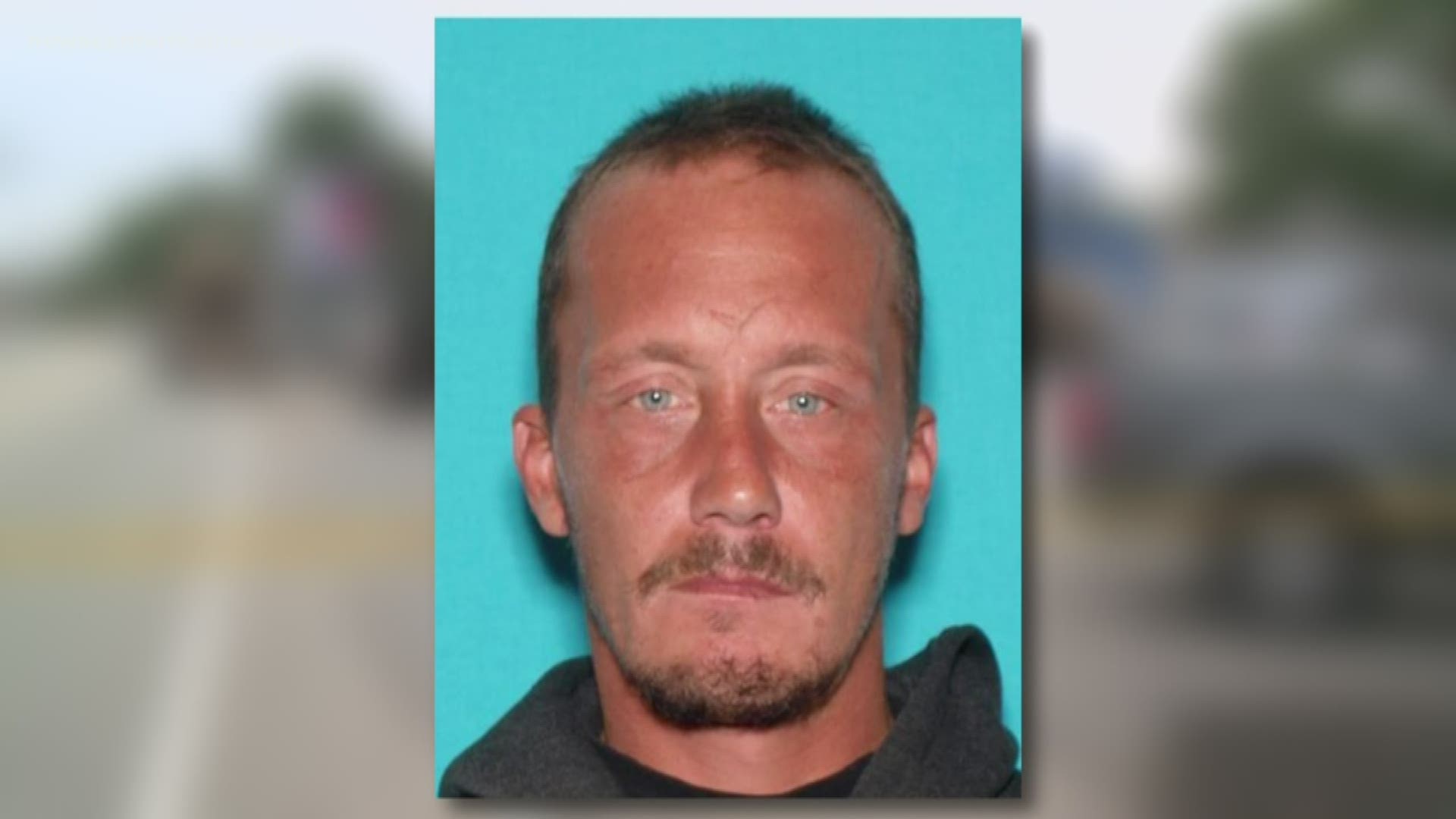 A Six-hour standoff ends with a manhunt in Saco.