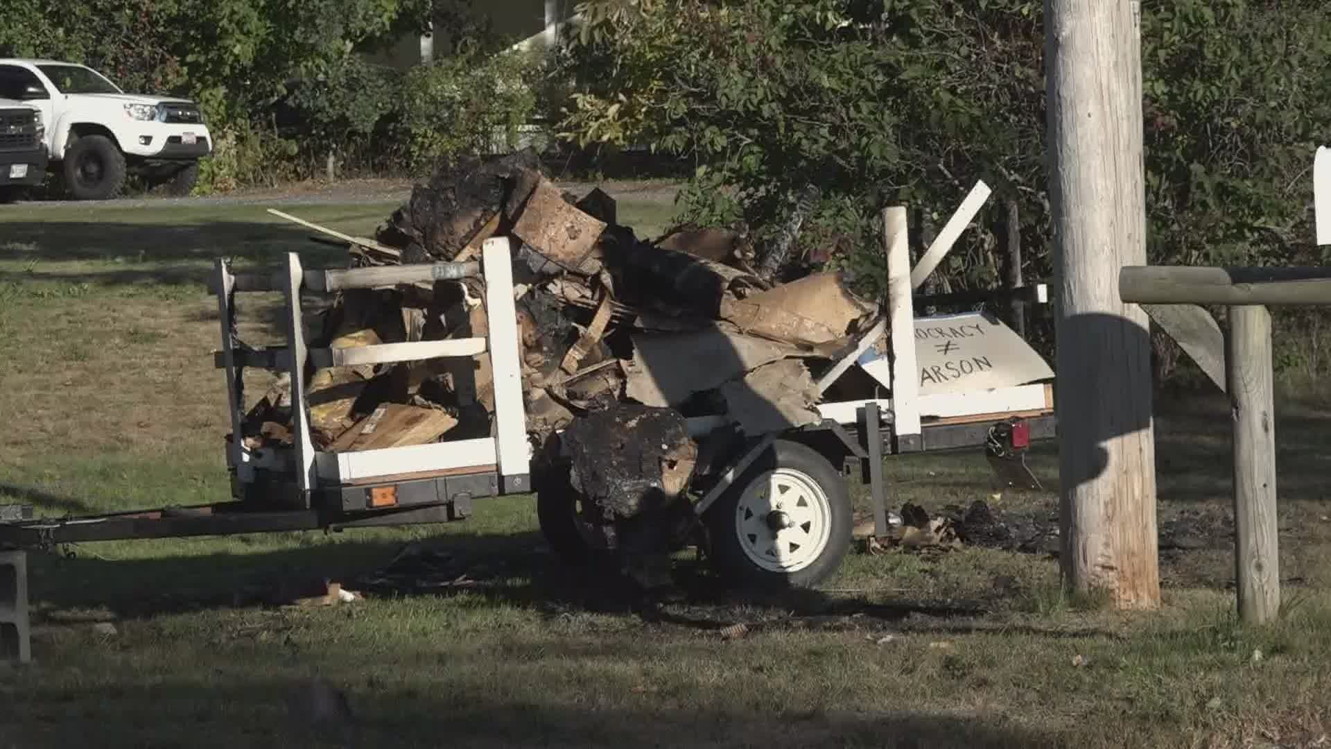 An artist's political sculpture was burned to the ground Saturday.