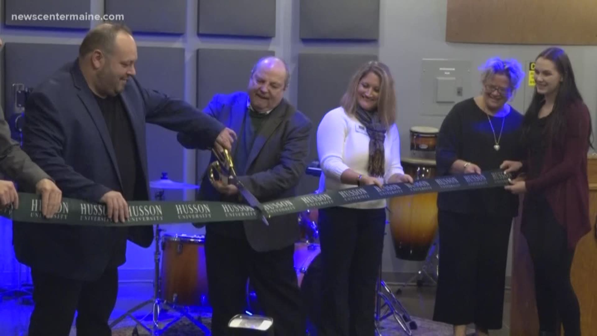 Husson University opens new recording studio with ribbon cutting.