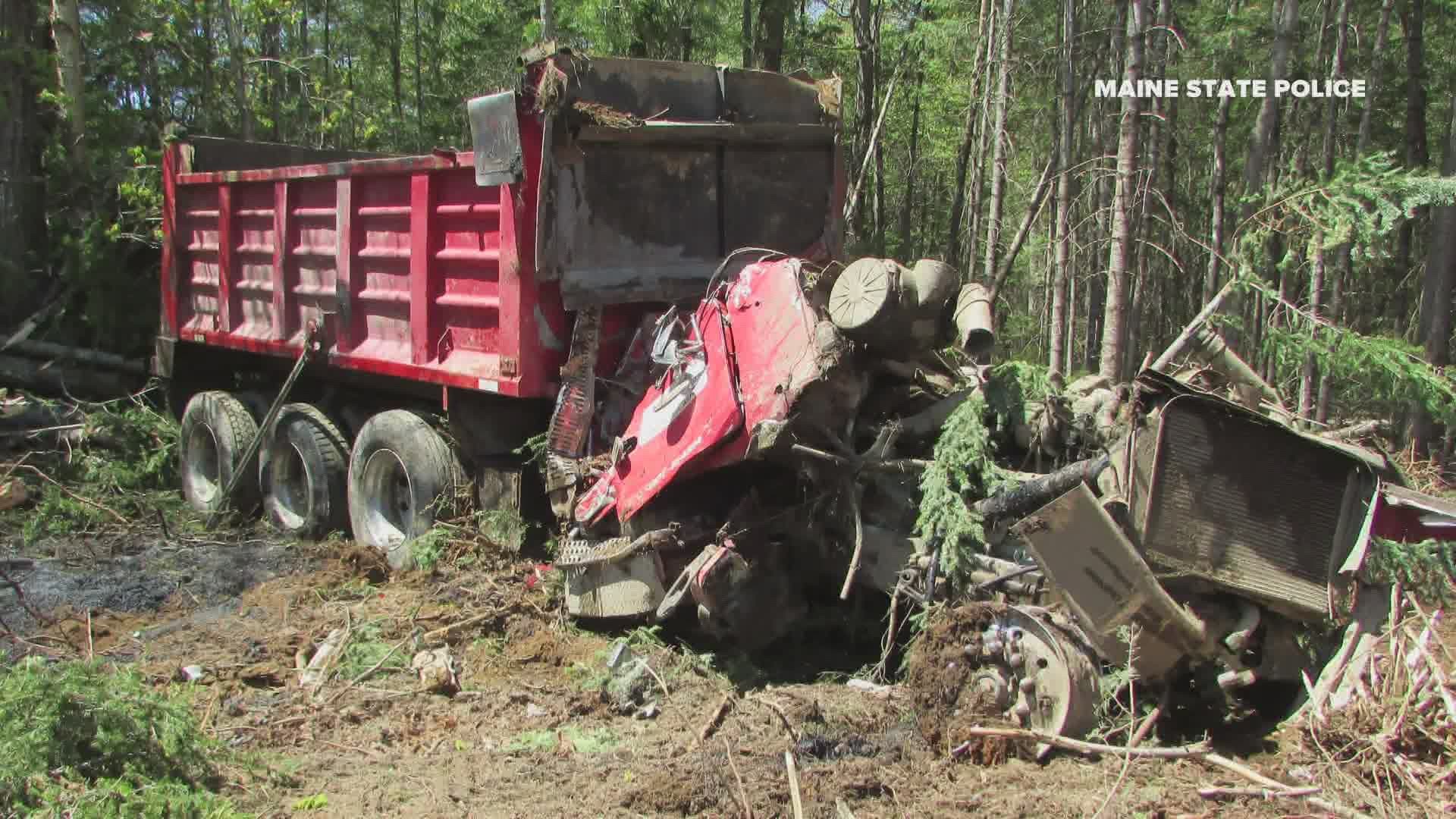 Michael Marshall of Houlton was driving a dump truck southbound in Dyer Brook when he lost control and rolled several times before hitting trees.